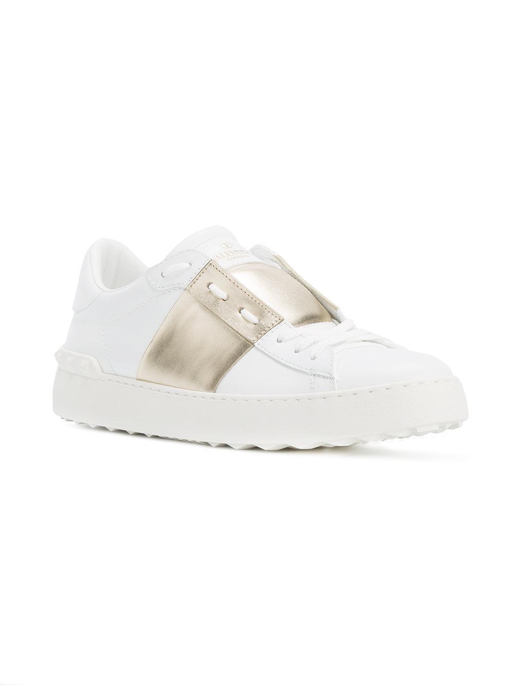 valentino sneakers gold and white