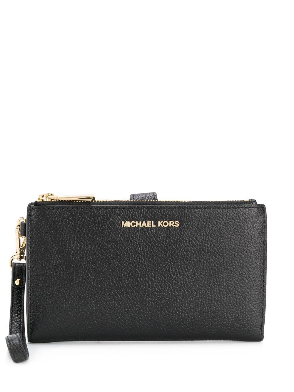 MICHAEL Michael Kors Jet Set Leather Clutch Bag in Black | Lyst