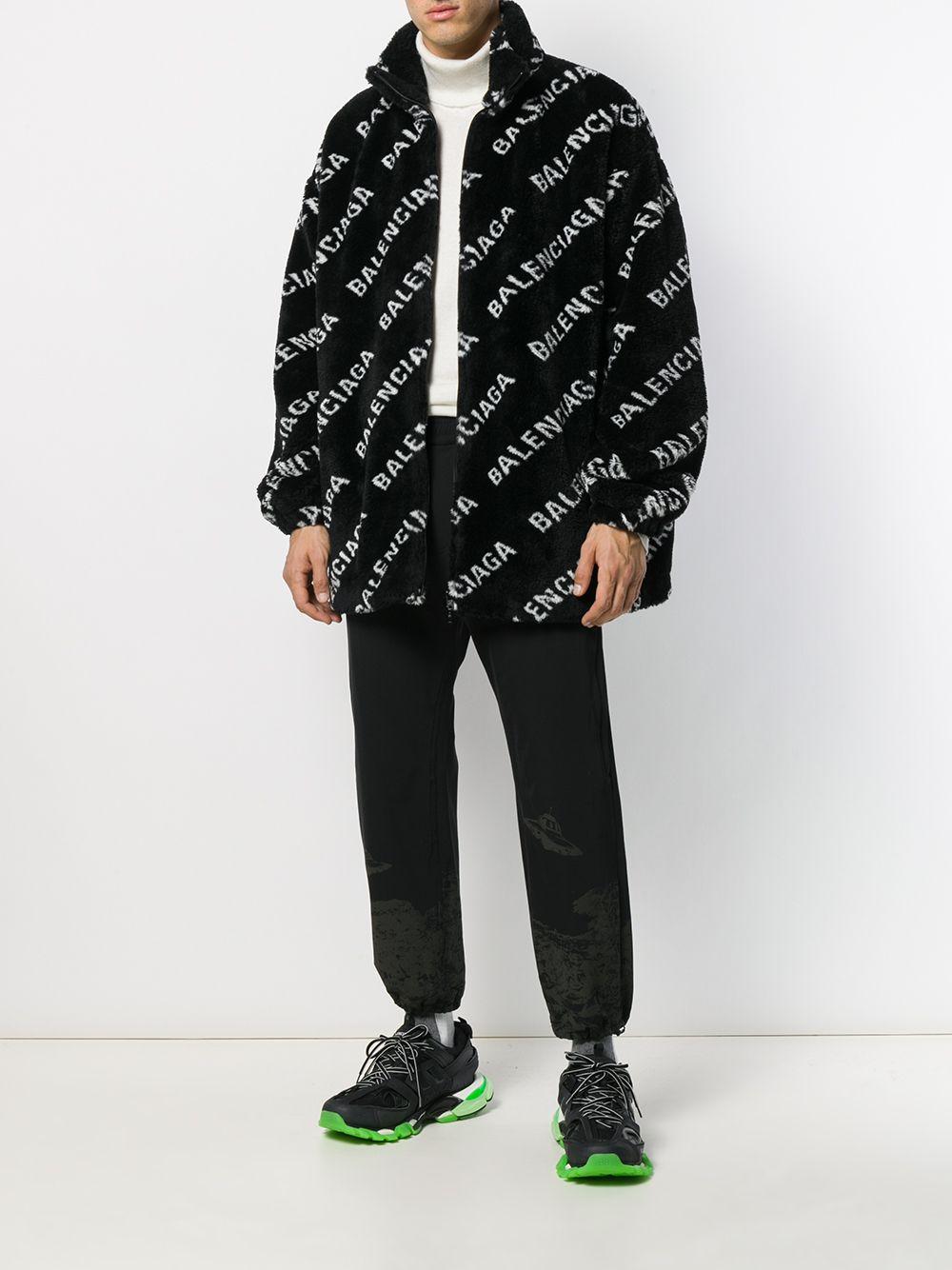 black fluffy zip up jacket