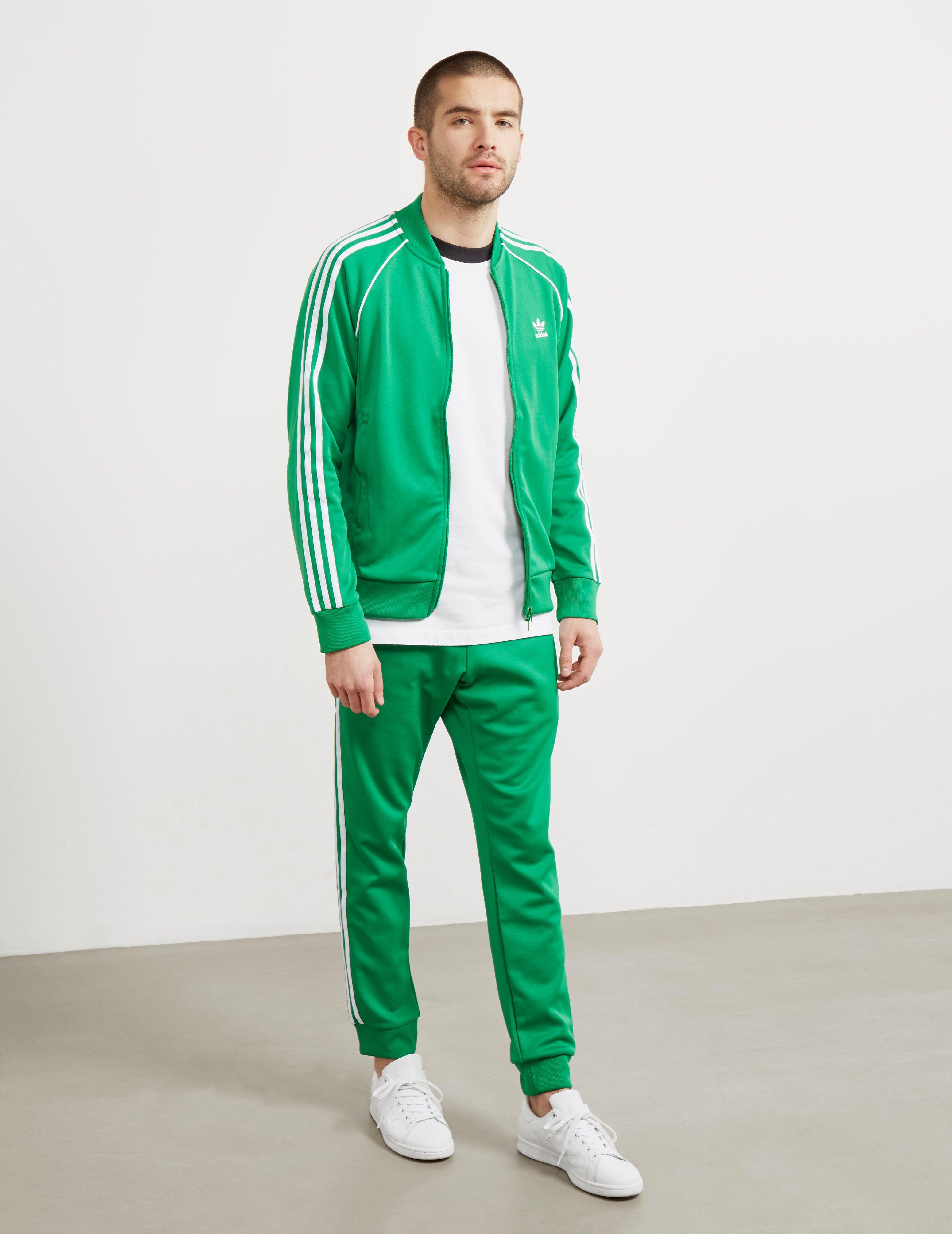 green adidas tracksuit top