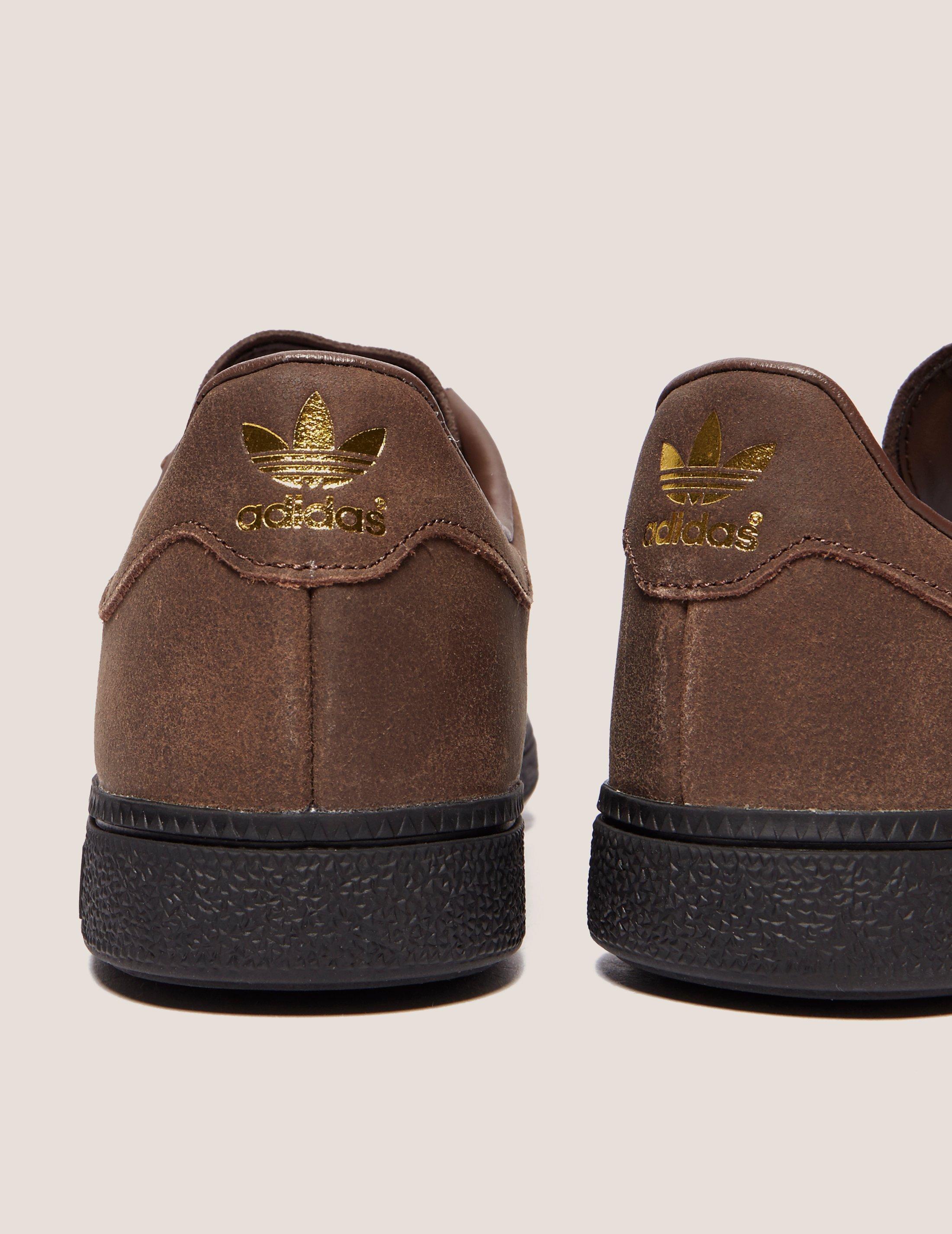 adidas sneakers with brown sole