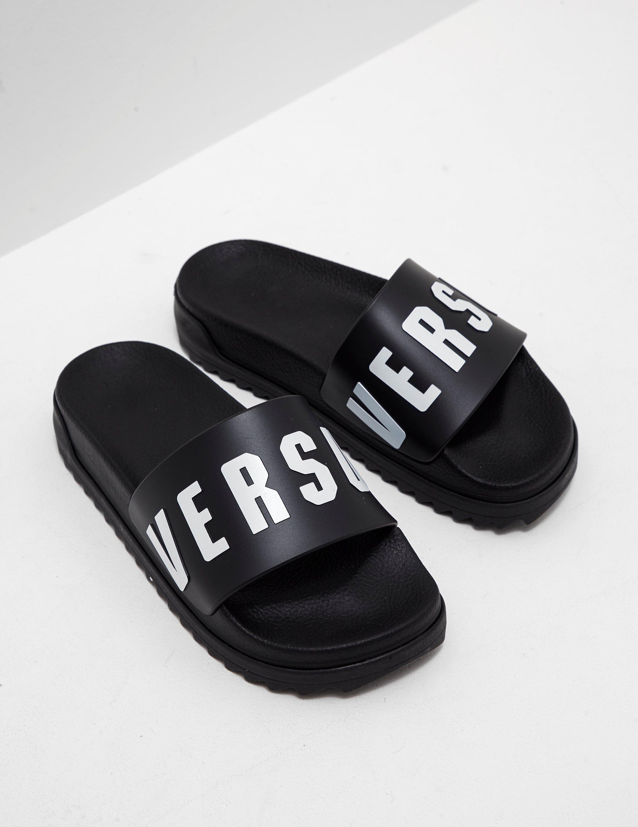 womens black designer slides