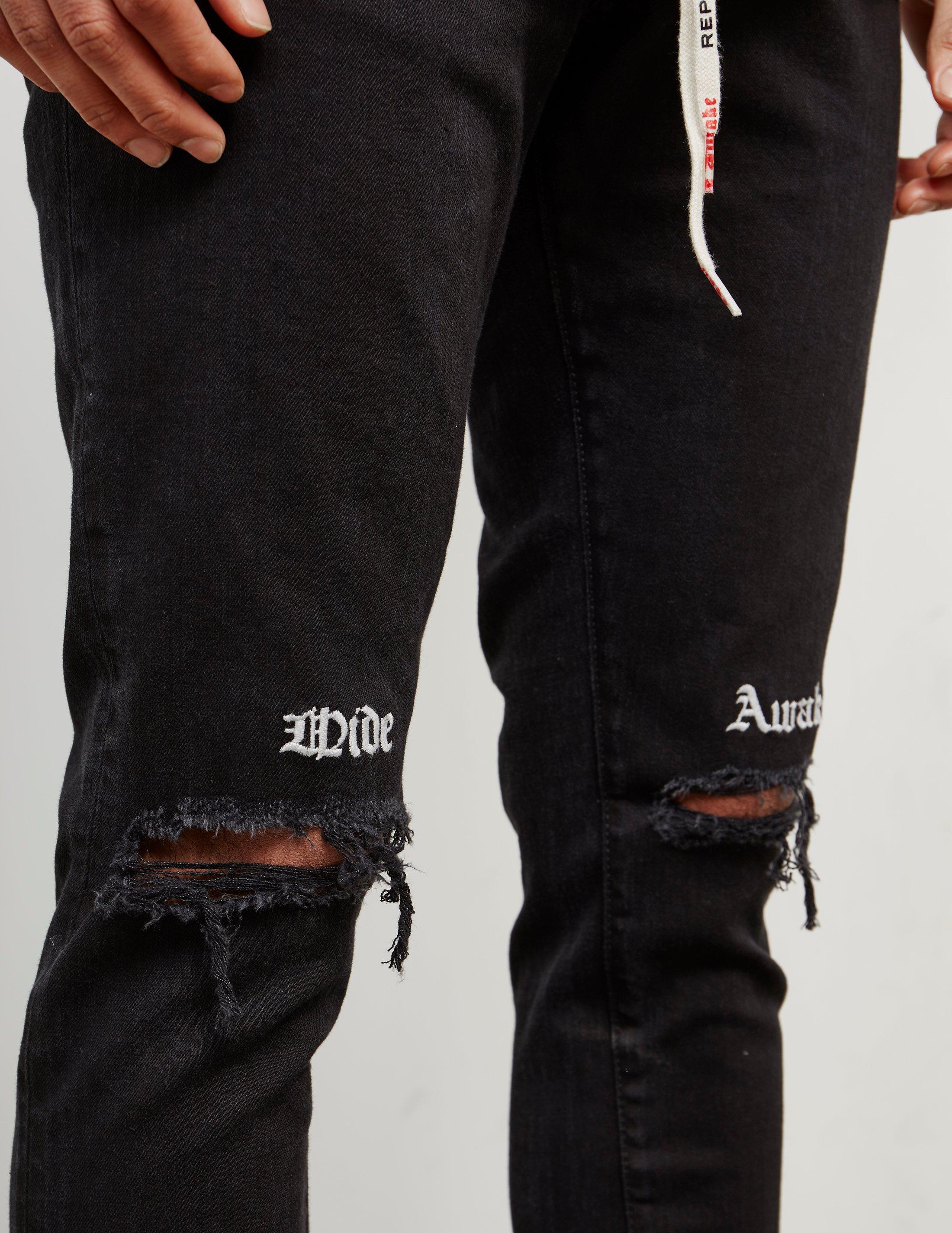 represent black jeans