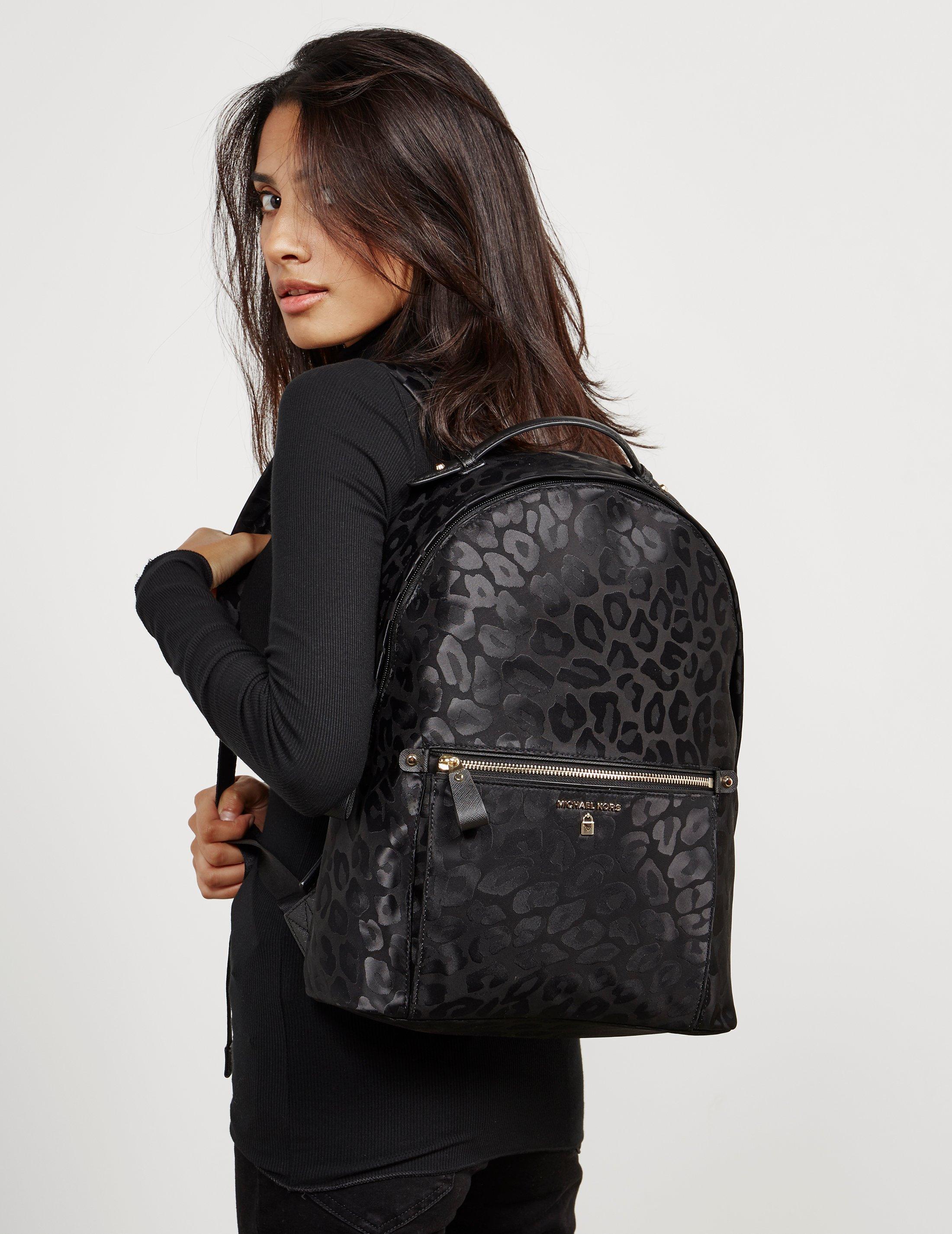 michael kors black leopard backpack