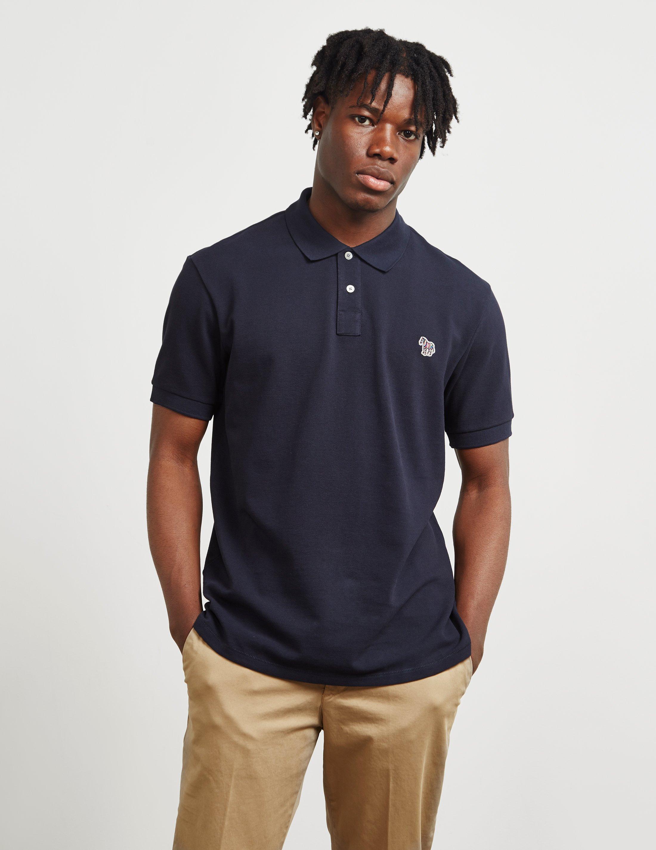 navy blue polo shirt and khaki pants