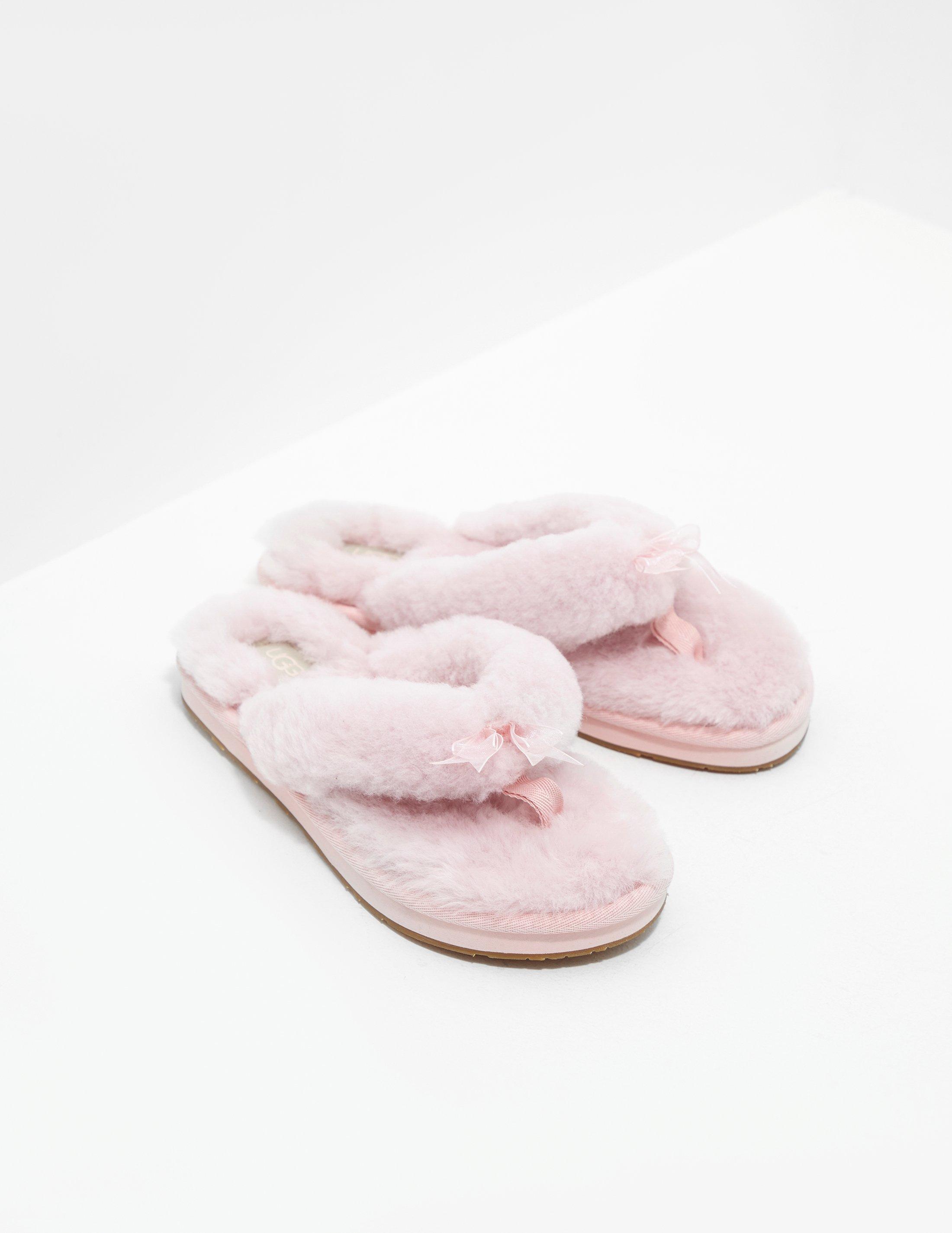 pink fluffy flip flops