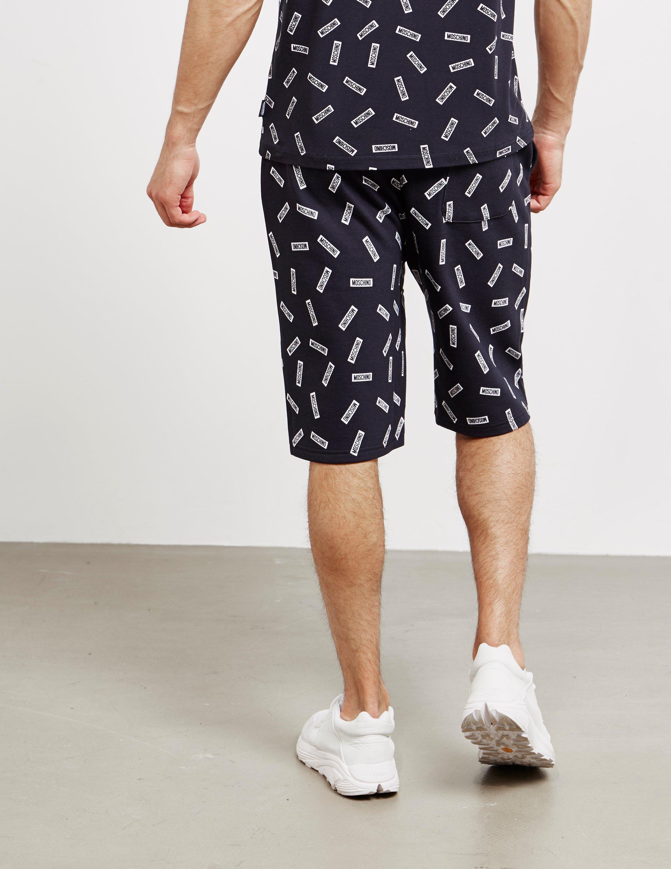 moschino all over print shorts