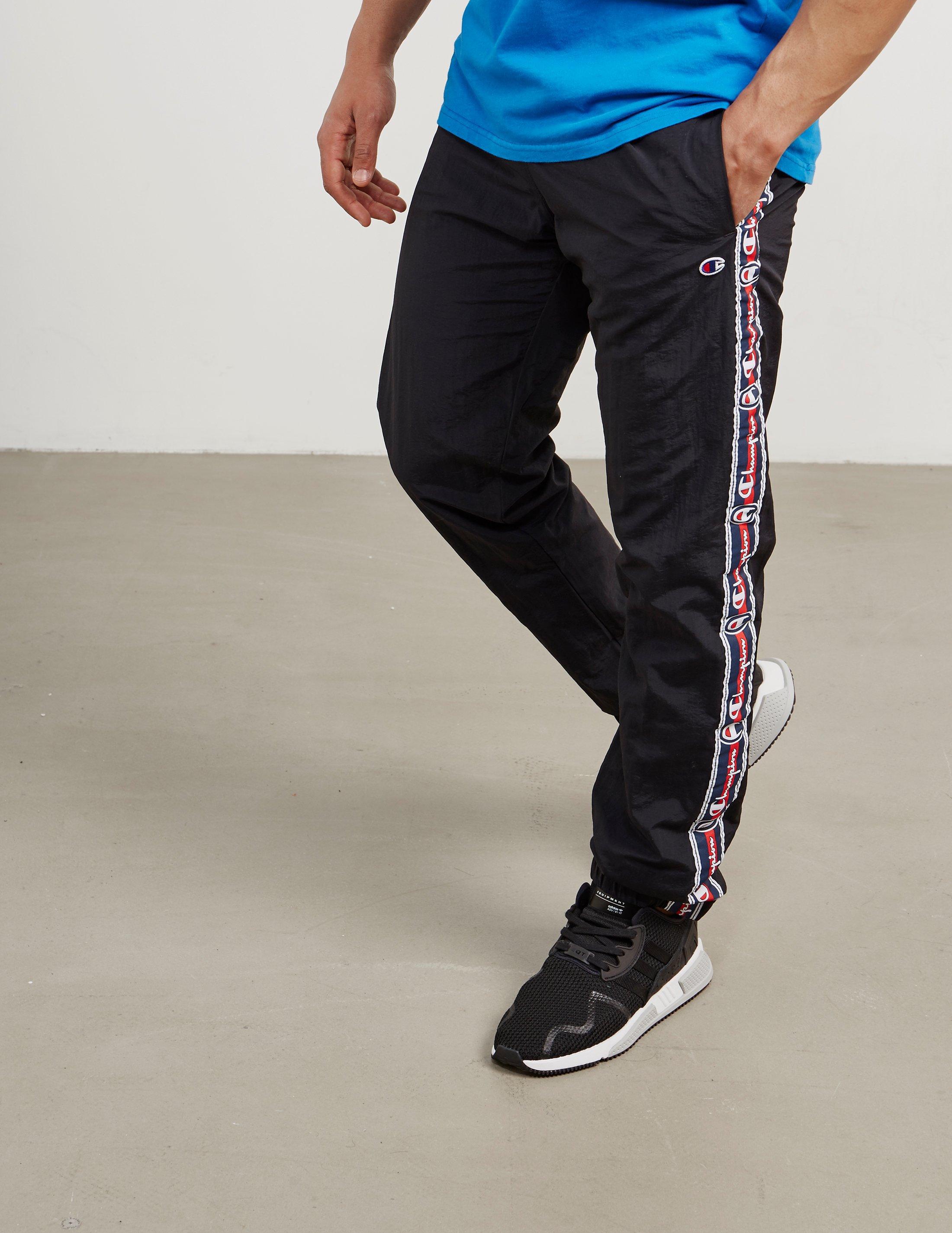 champion black & red taping track pants