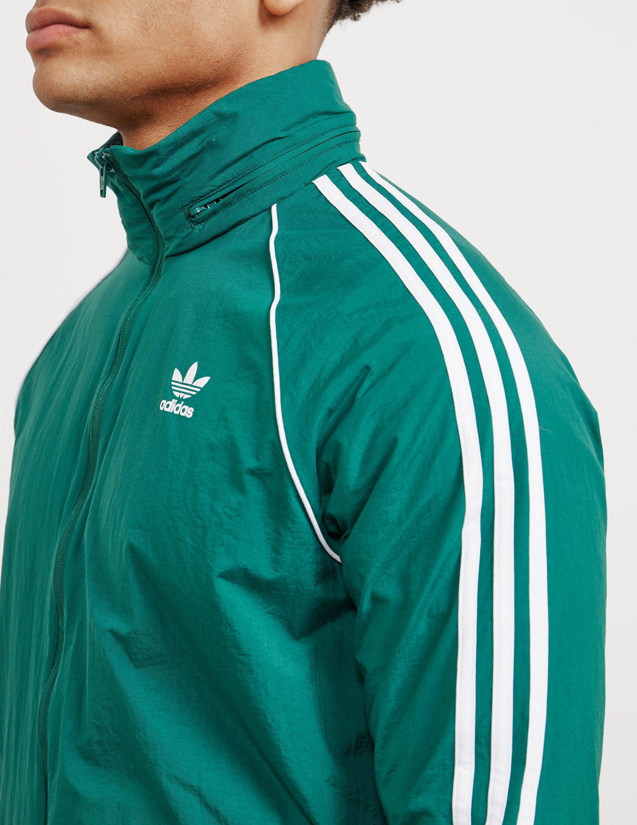 green and white windbreaker