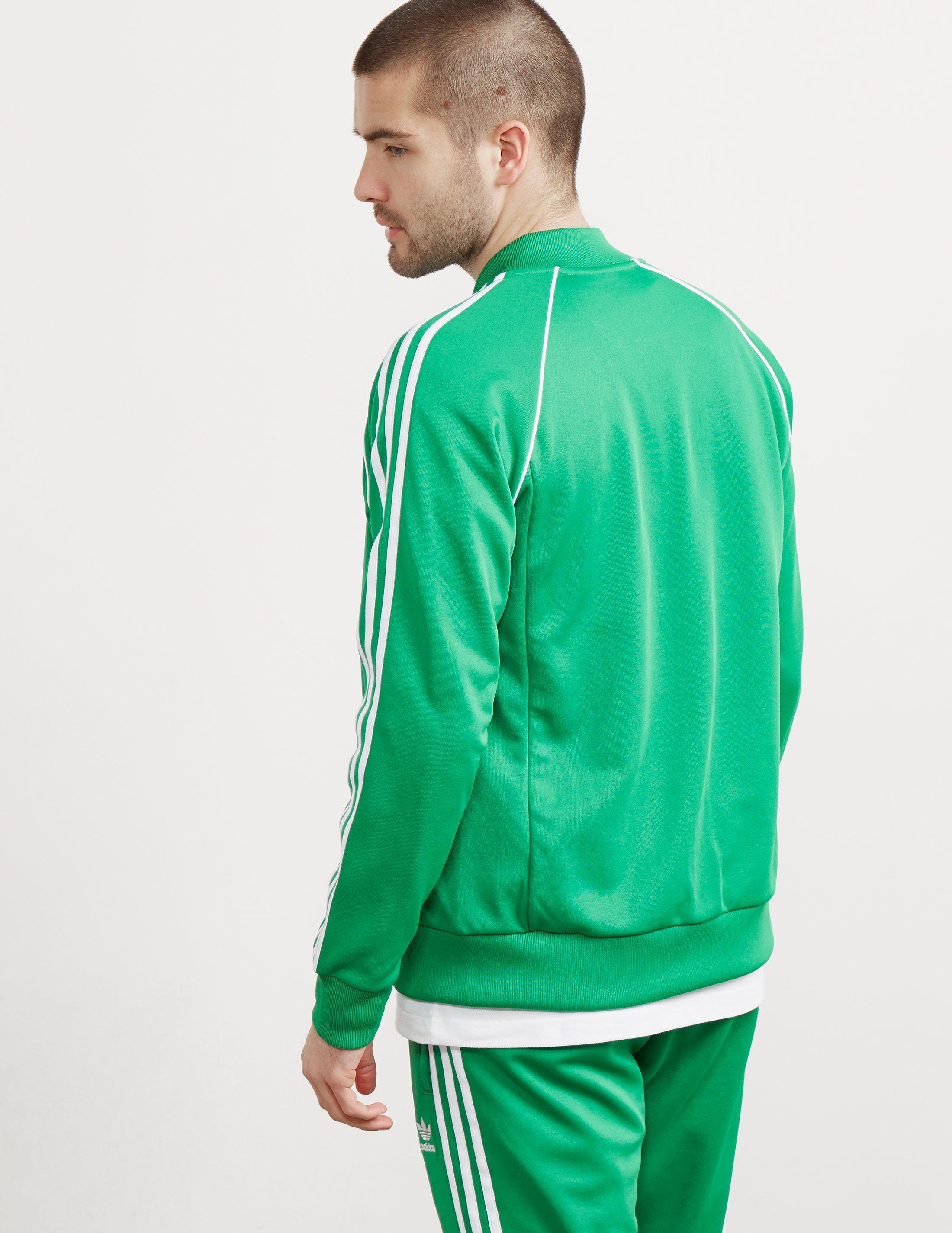 adidas - court superstar track top in green/white