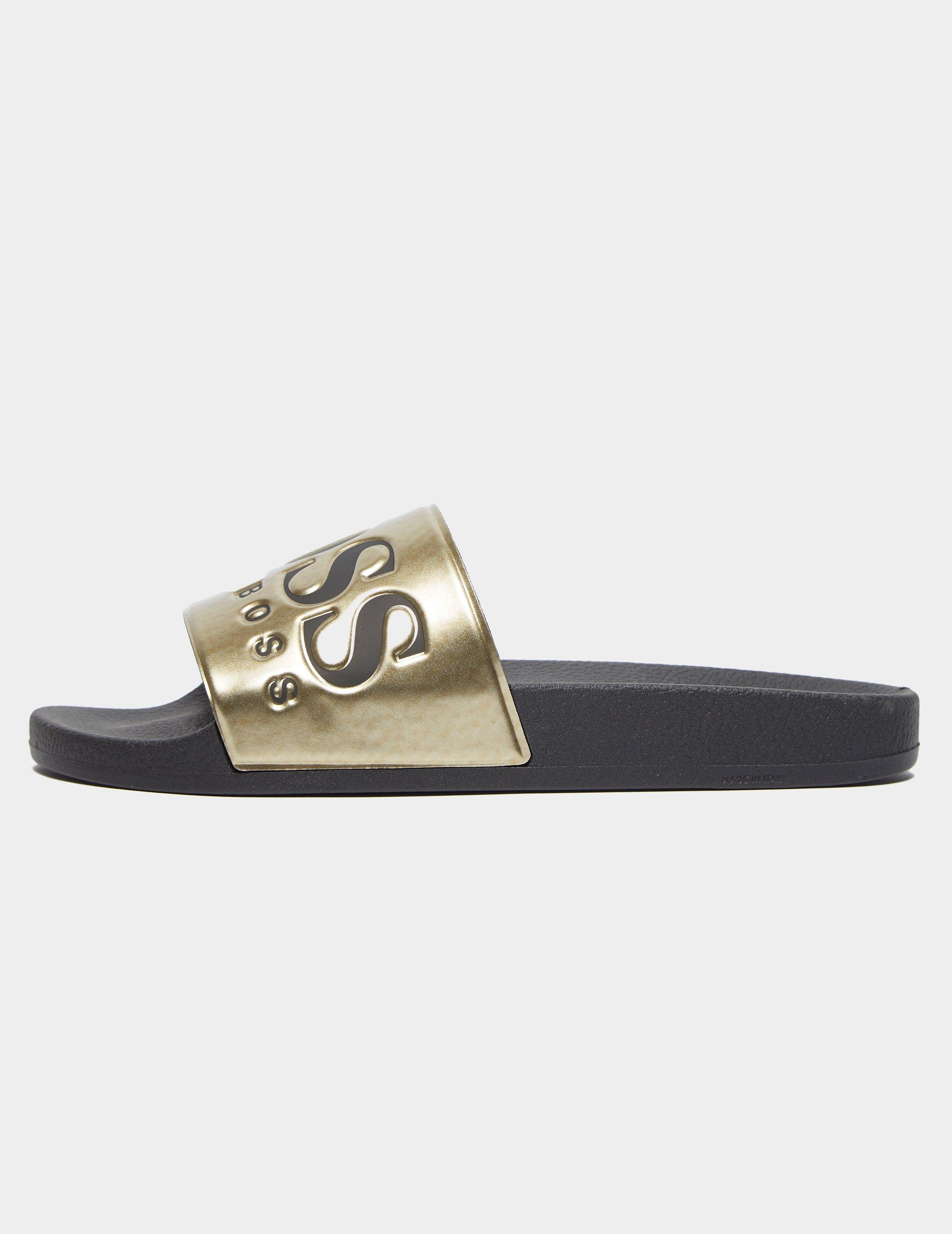 gold hugo boss sliders