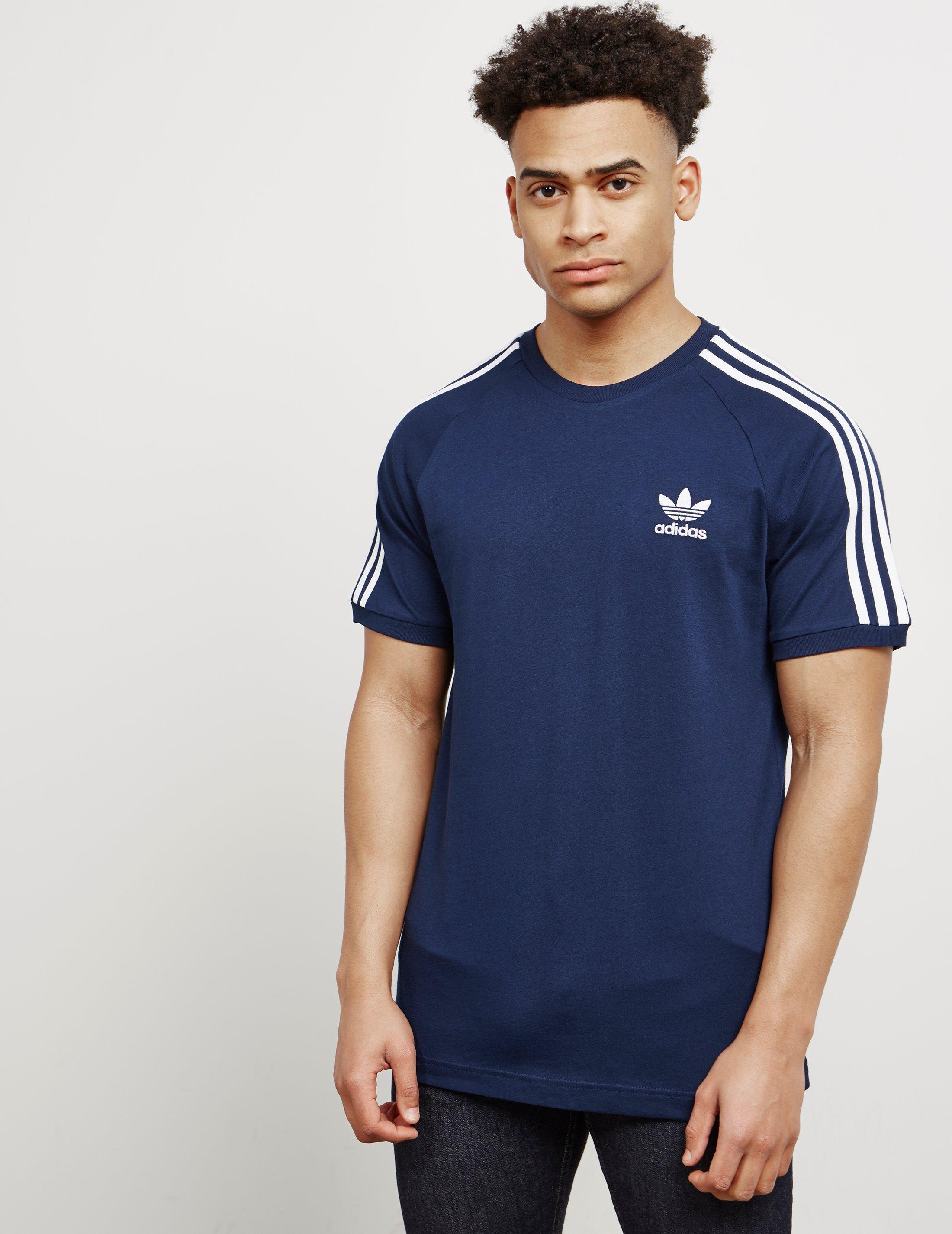 Buy > white and navy blue adidas shirt > in stock