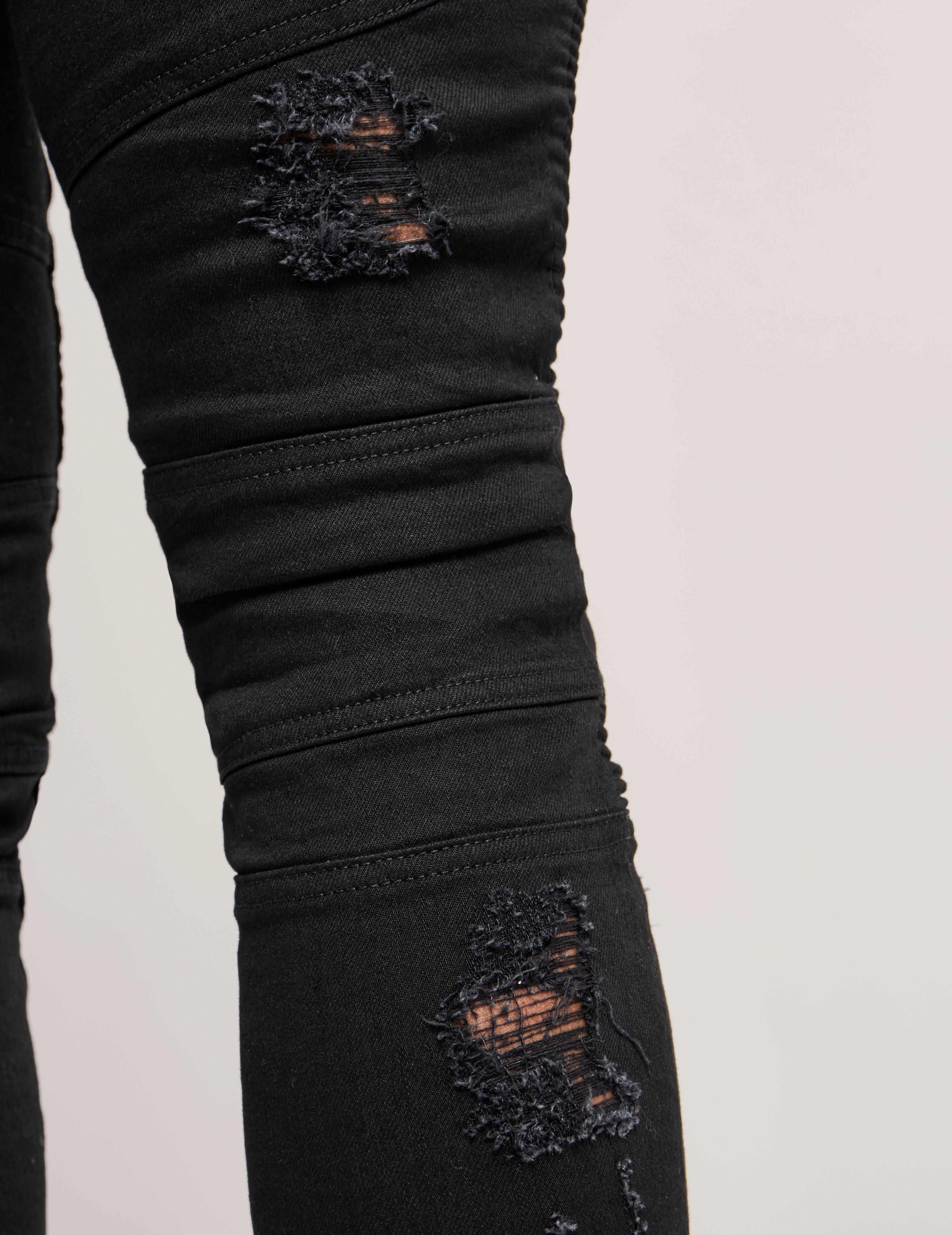 represent black jeans