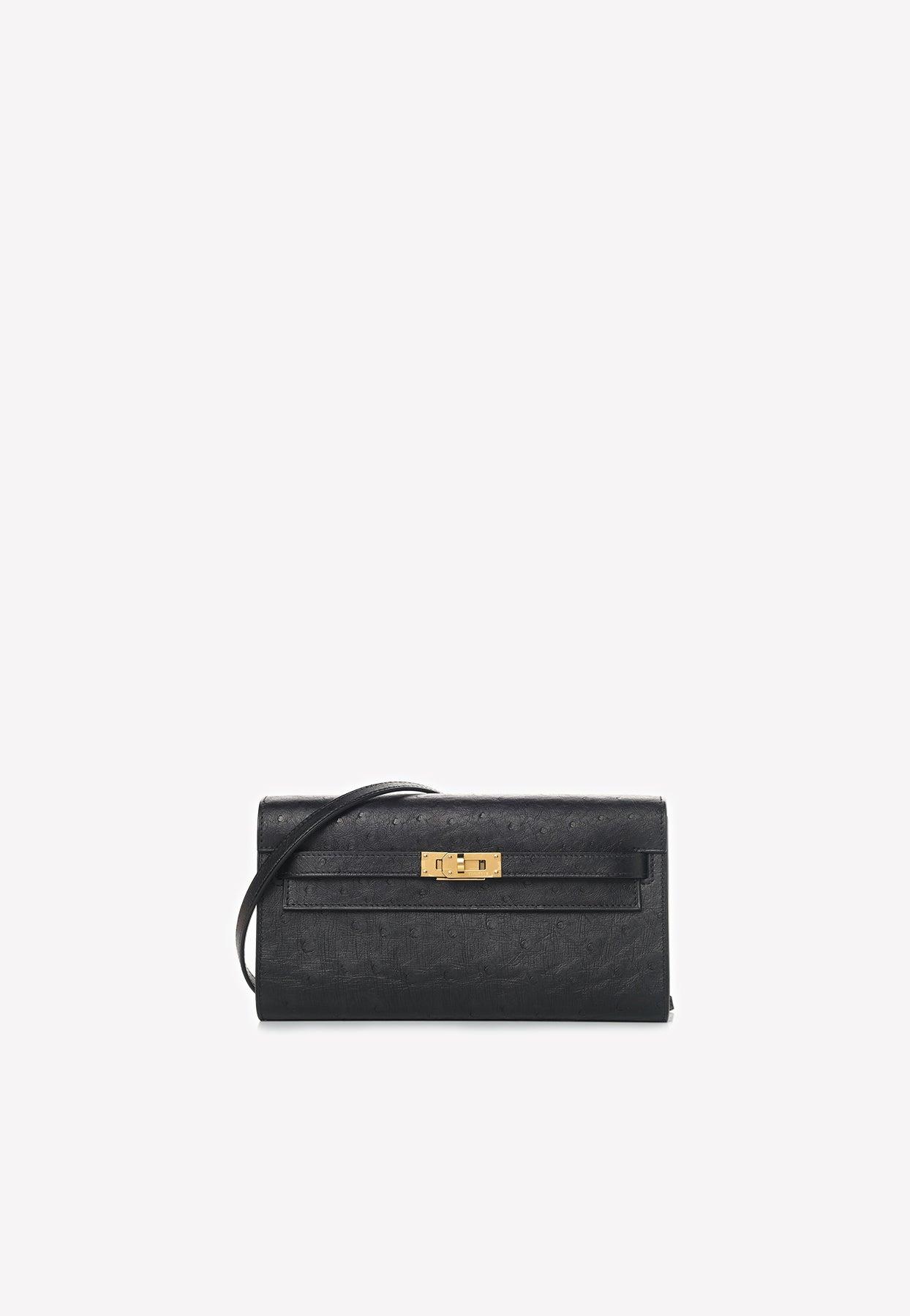 Hermès Kelly To Go Wallet In Black Ostrich With Gold Hardware in