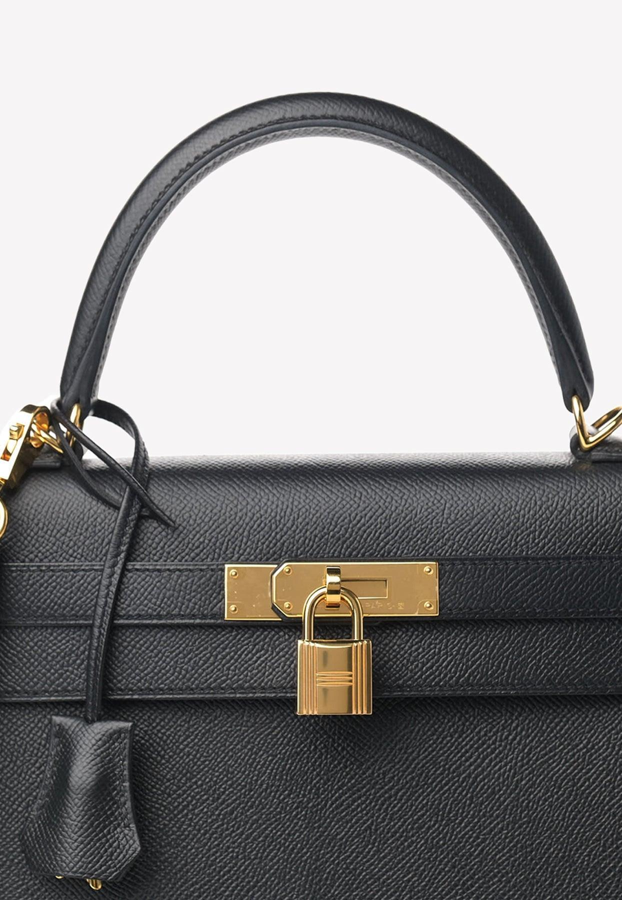 A BLACK EPSOM LEATHER SELLIER KELLY 28 WITH GOLD HARDWARE, HERMÈS