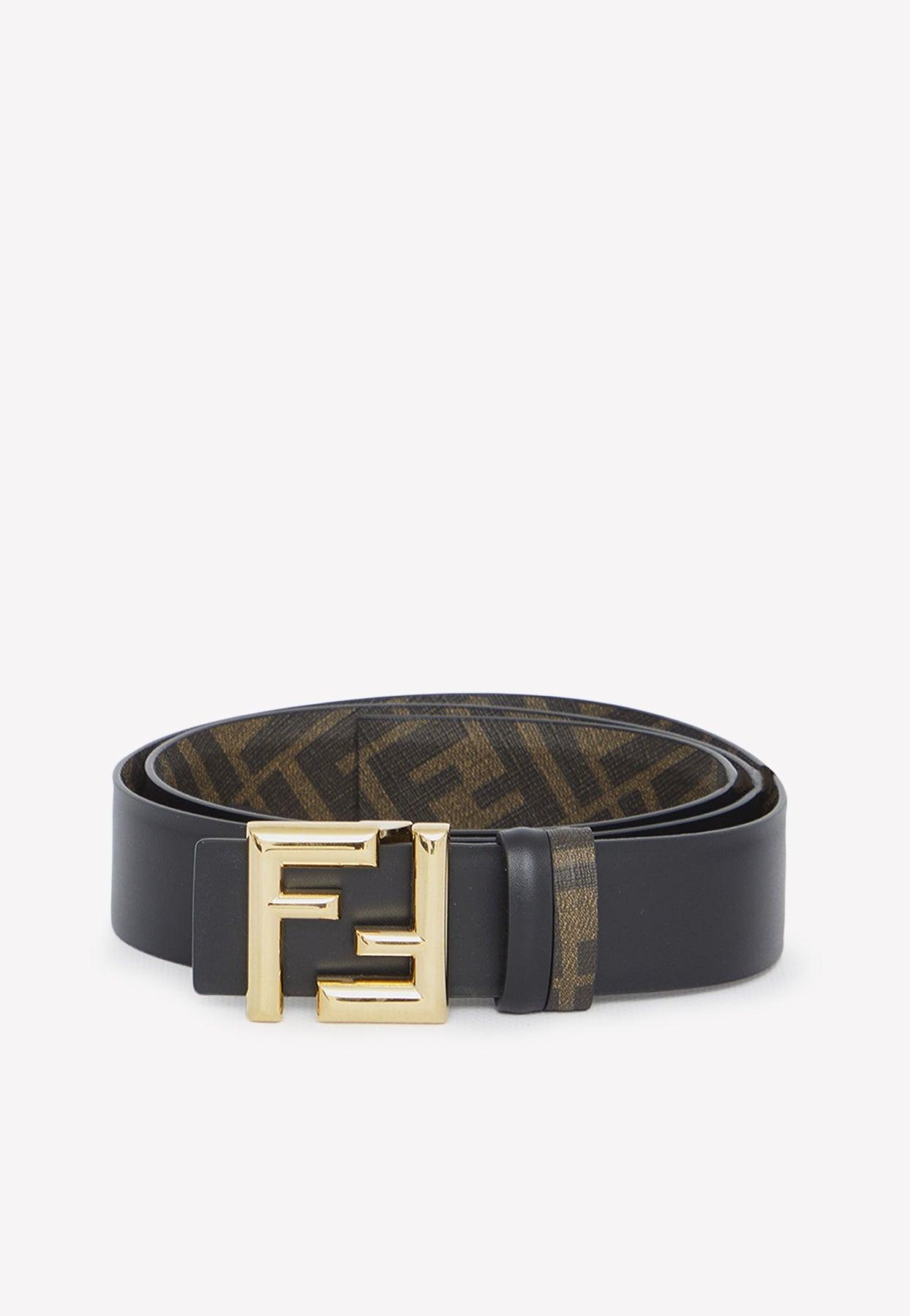 Louis Vuitton belt. Black and Grey with gold emblem.