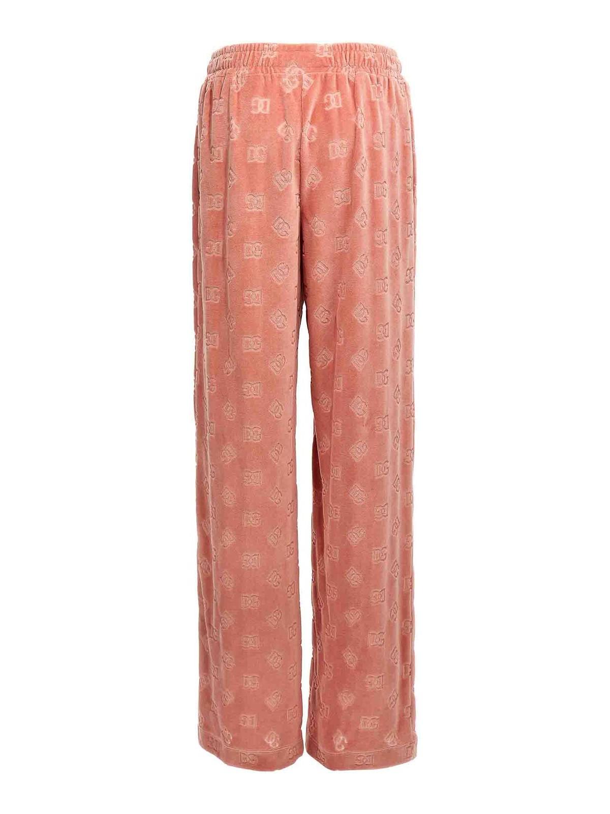 パンツ DOLCE & GABBANA Logo joggers Pink Chenille jogging pants with jacquard DG logo in Pink for