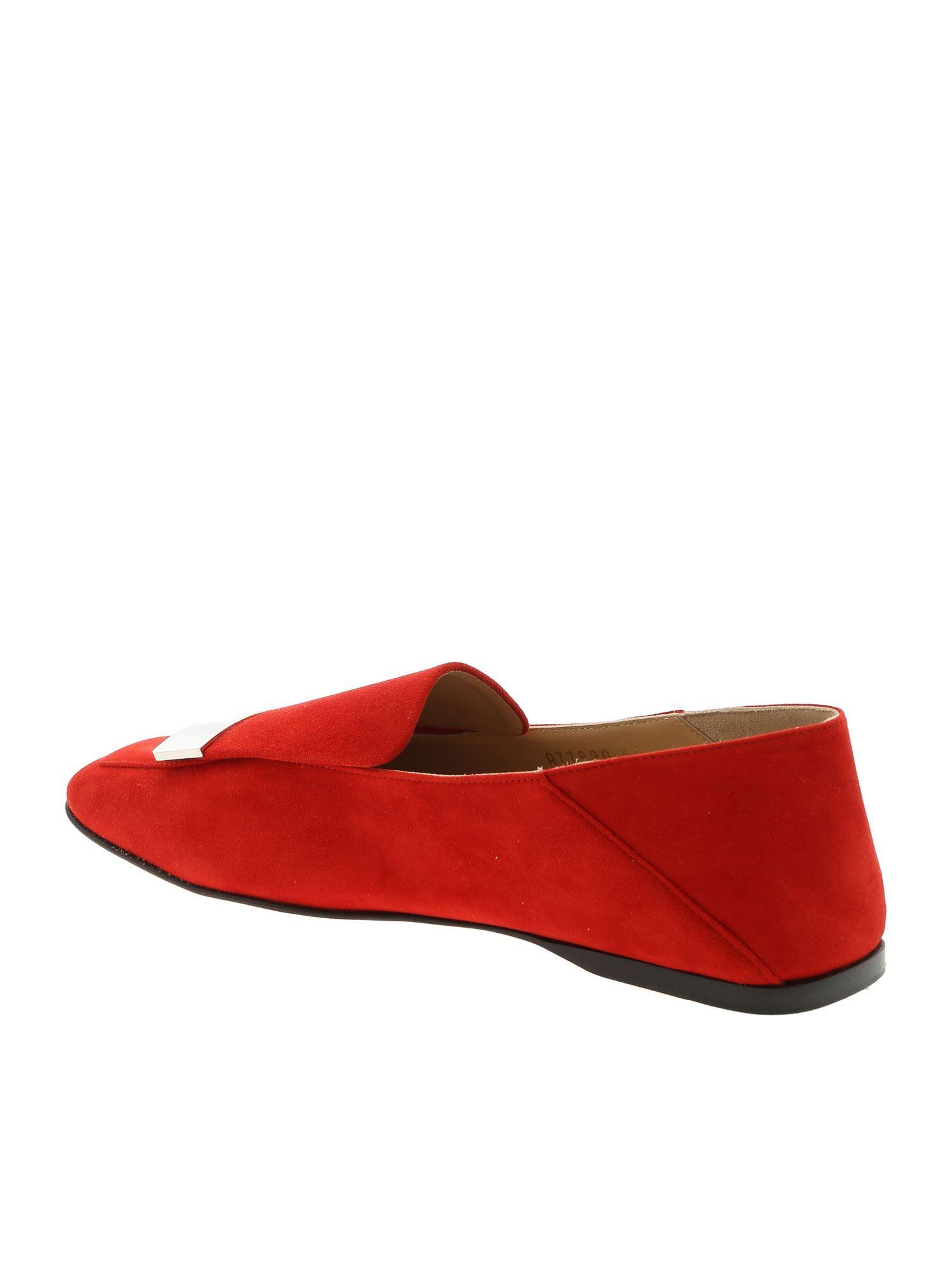 red and silver loafers