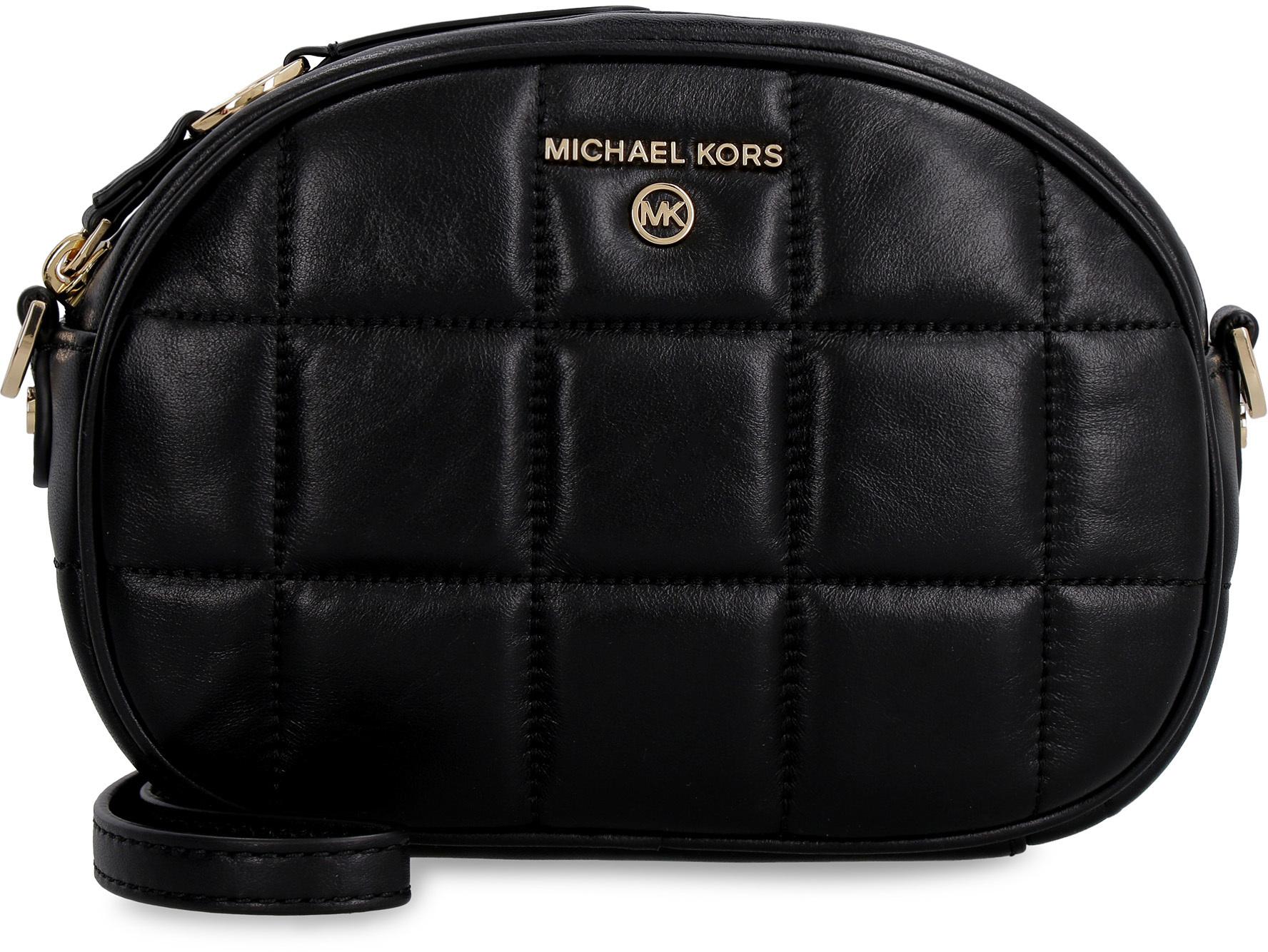 mk jet set camera bolsa