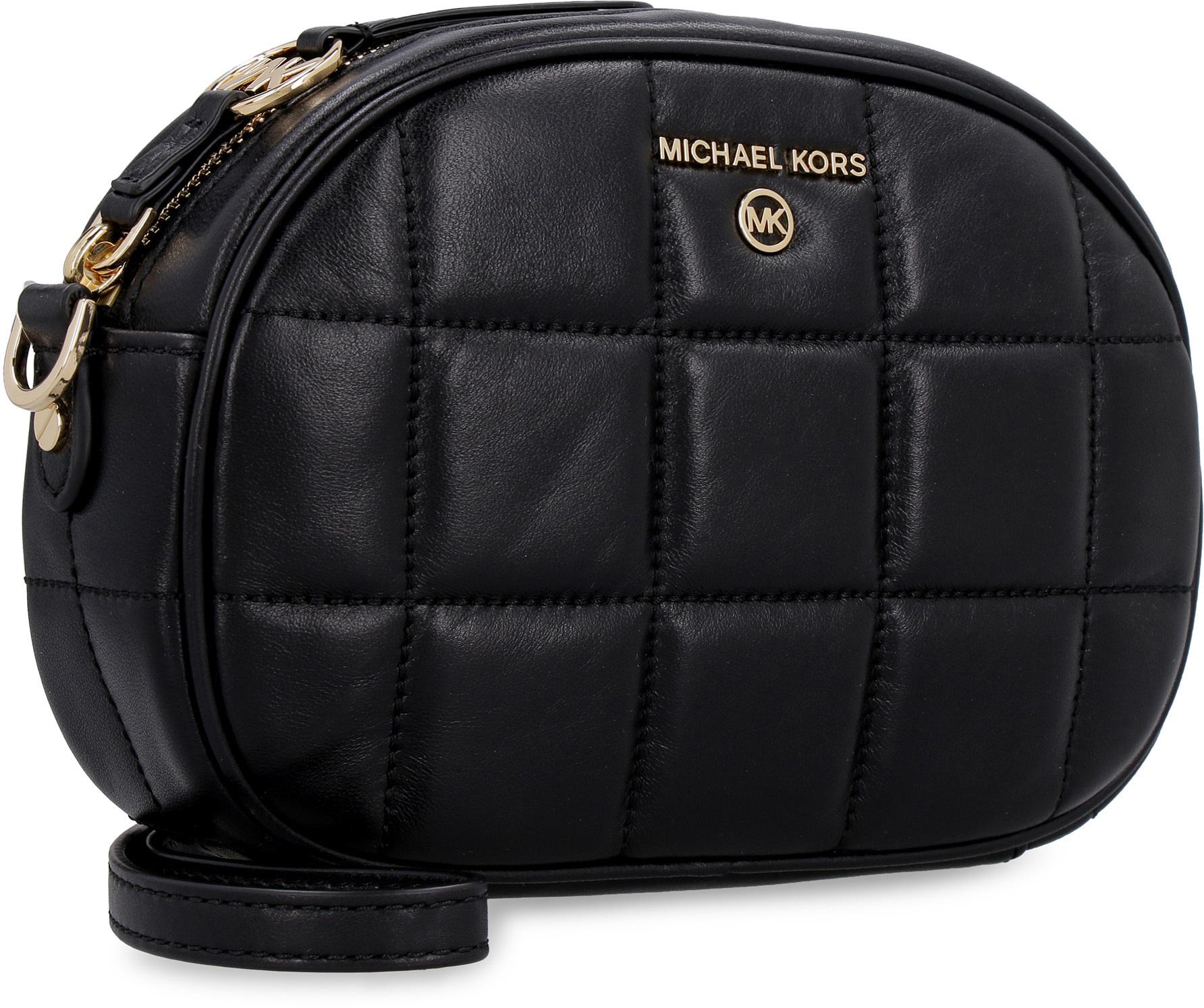 mk jet set camera bolsa