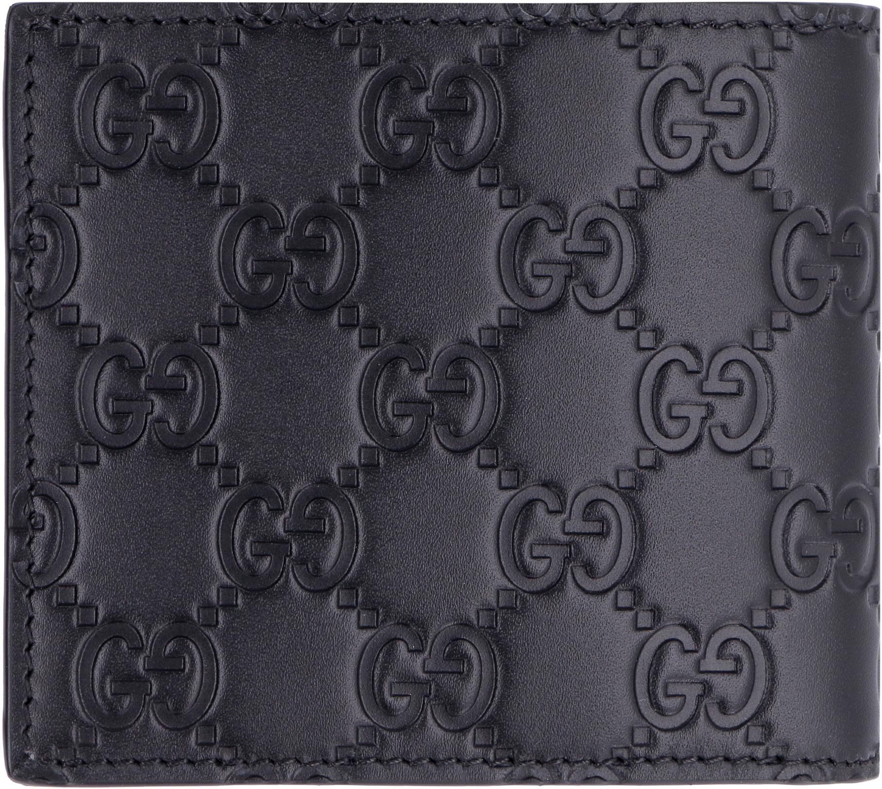 GG Embossed Leather Wallet in Black - Gucci