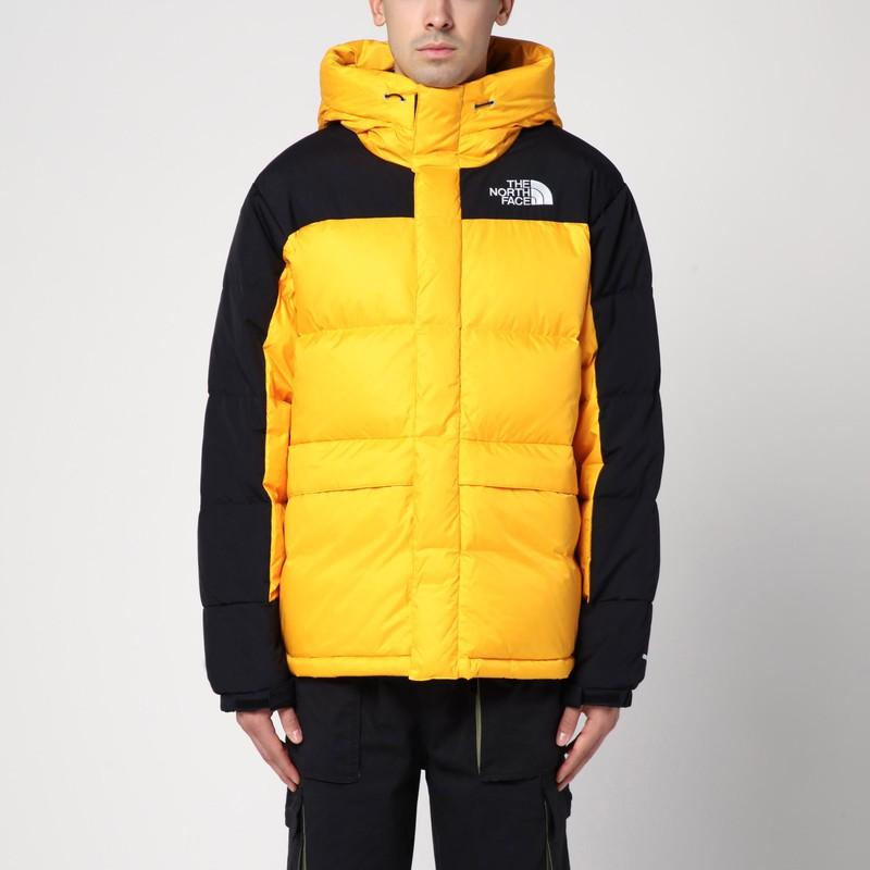 The north face veste jaune et noir sale