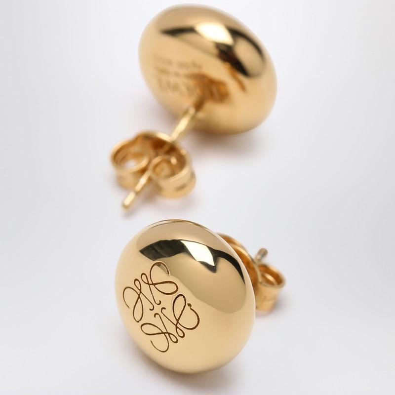 Orecchini a bottone anagram pebble dorati di Loewe in