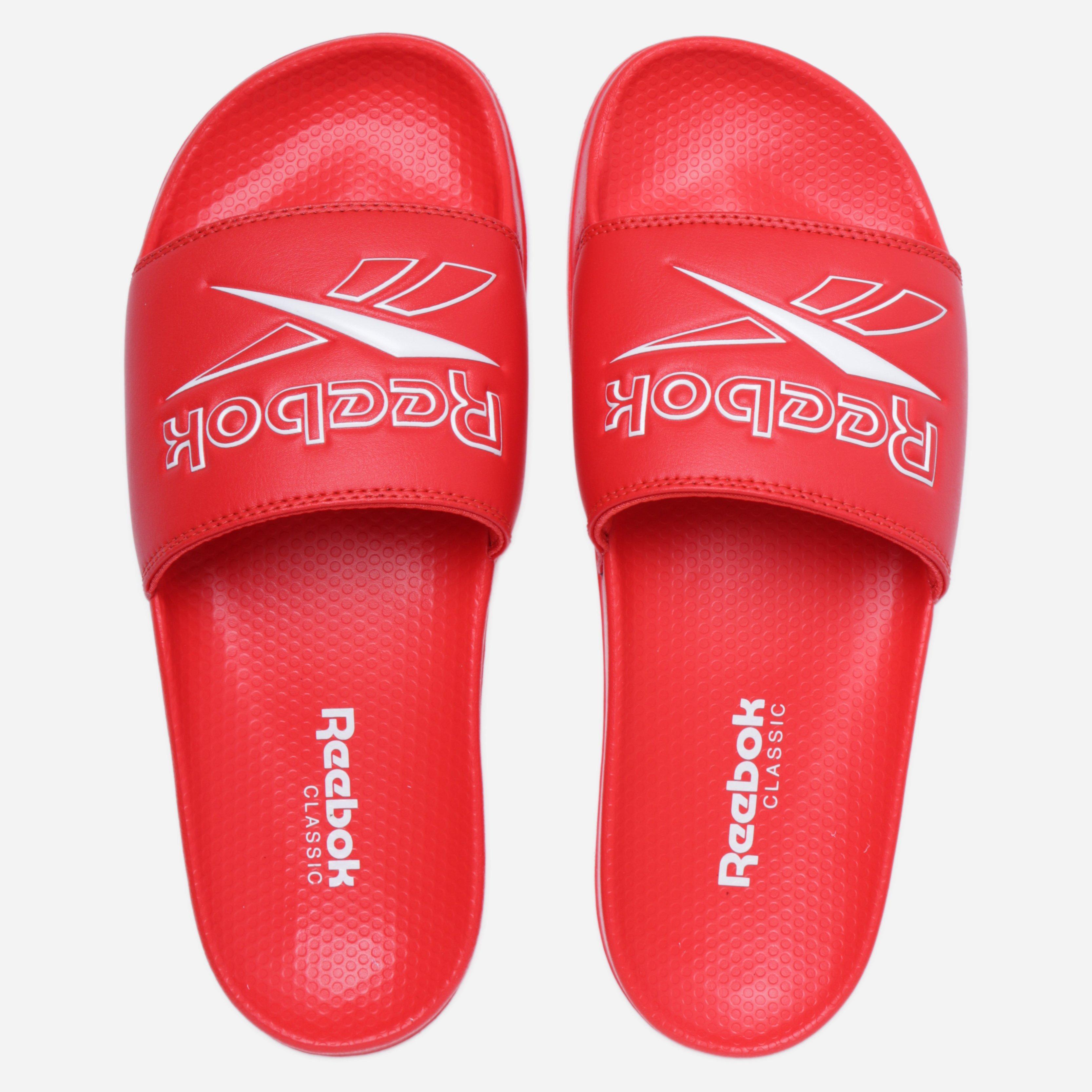 red reebok slides