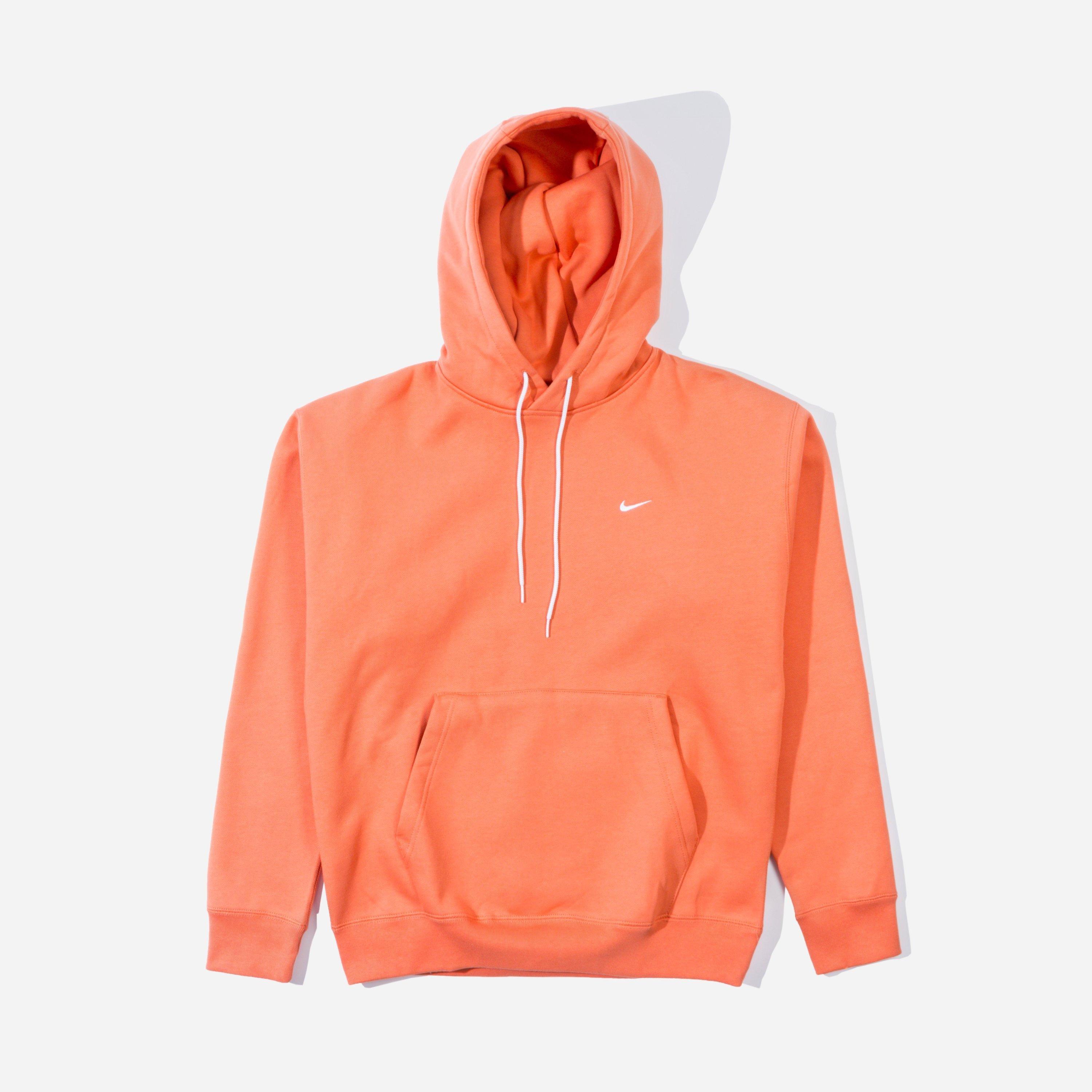 orange nike pullover hoodie