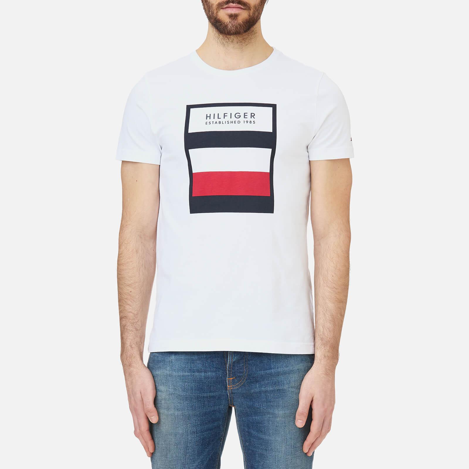 Tommy hilfiger usa. Tommy Hilfiger. Хилфигер Томми Хилфигер значок. Русский в Томми Хилфигер. Tommy Hilfiger t Shirt.