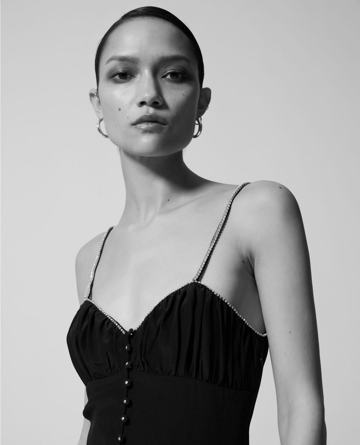 black dress with rhinestone straps