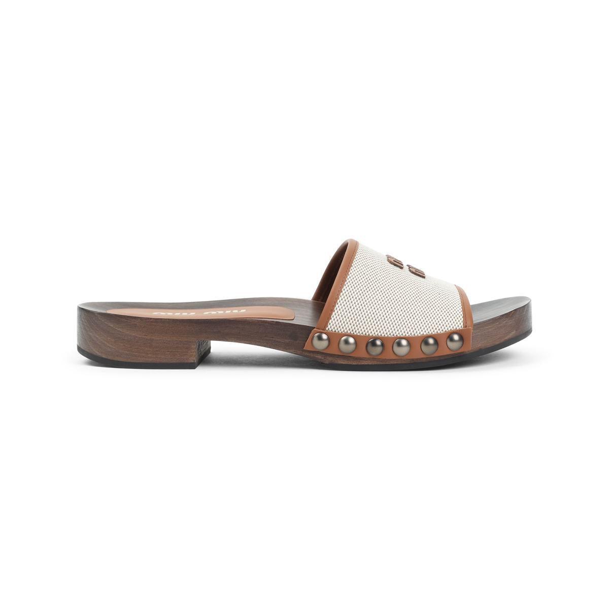 シューズ・サンダルその他 MIU MIU Woman Flat sandals Brown 5Y184E3L74 F0005 Miu Miu - Riviere flat sandals brown - The Corner