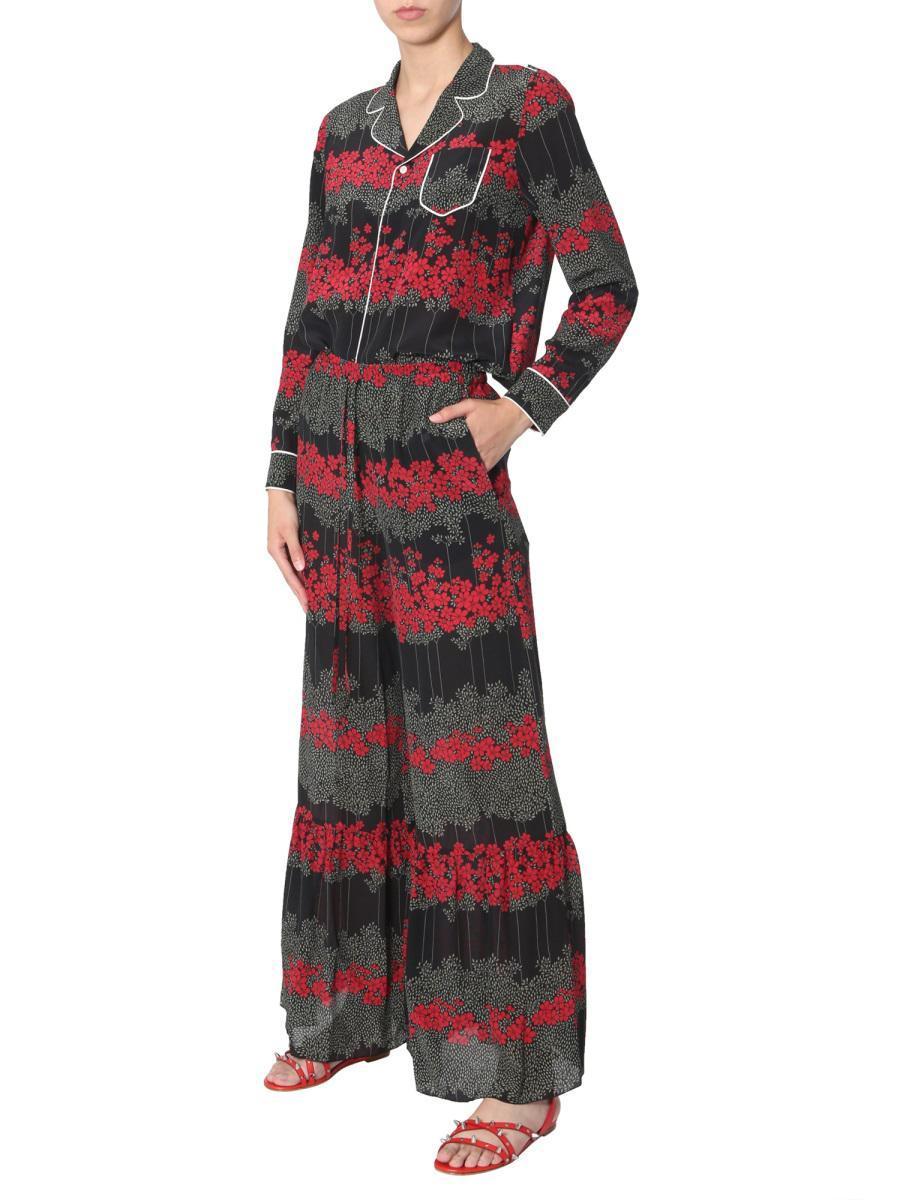 パンツ RED VALENTINO DREAMING PEONY PRINT SILK TROUSERS RED Valentino Dreaming Peony Print Trousers in Red | Lyst