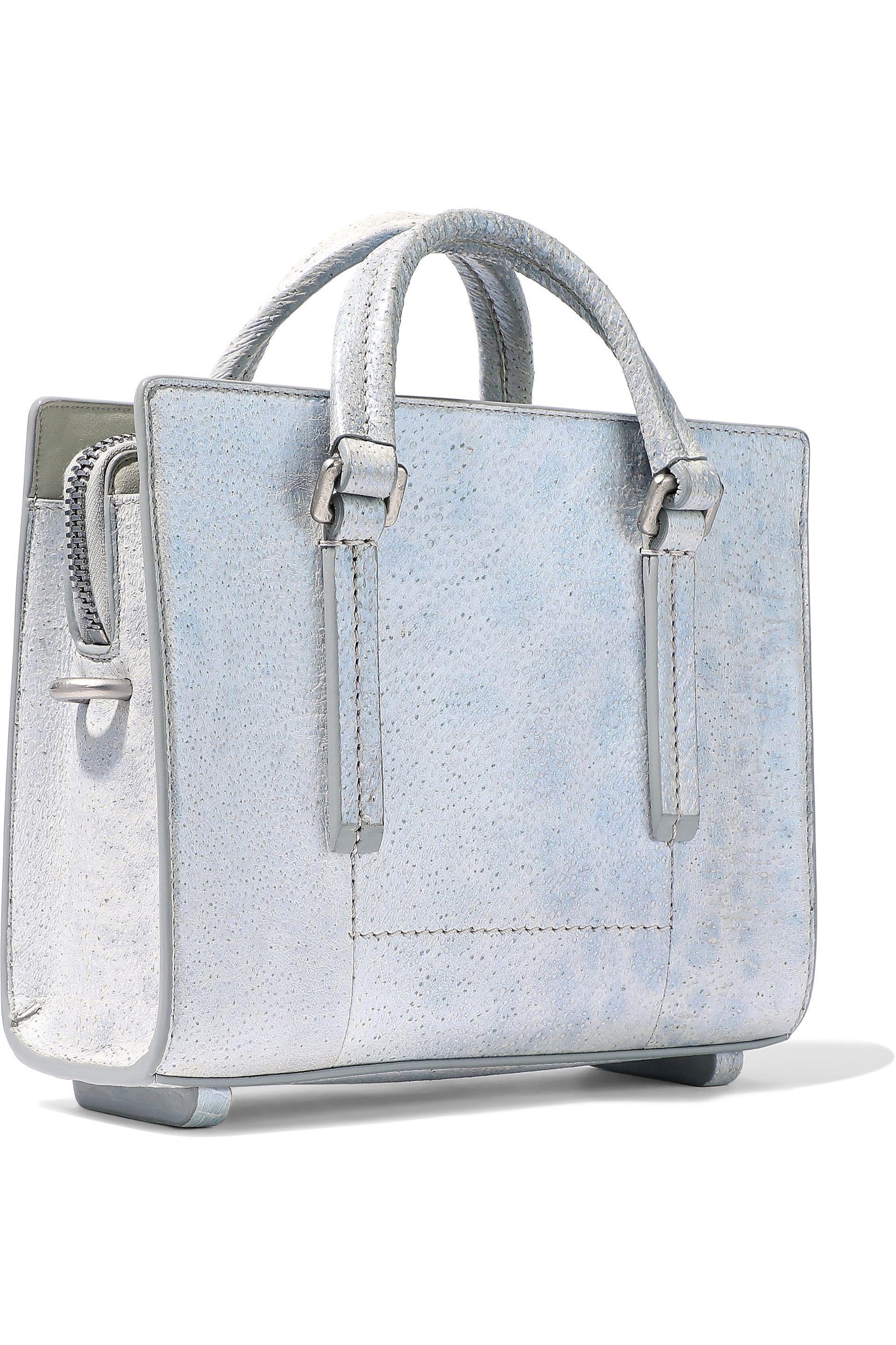 Grey Designer Handbags Salesman