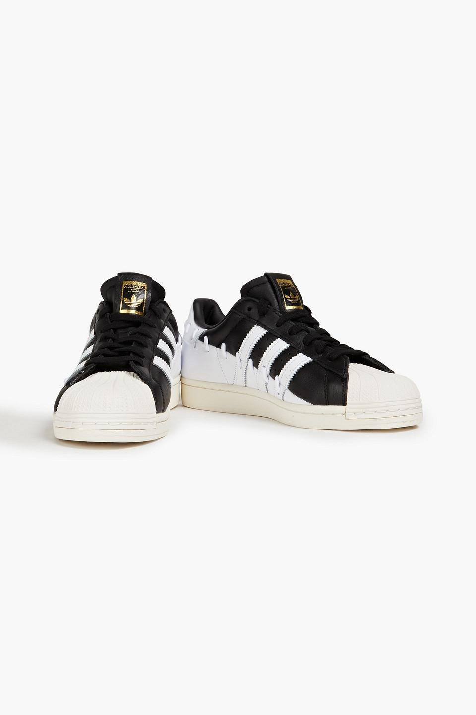 Shoes with store two stripes