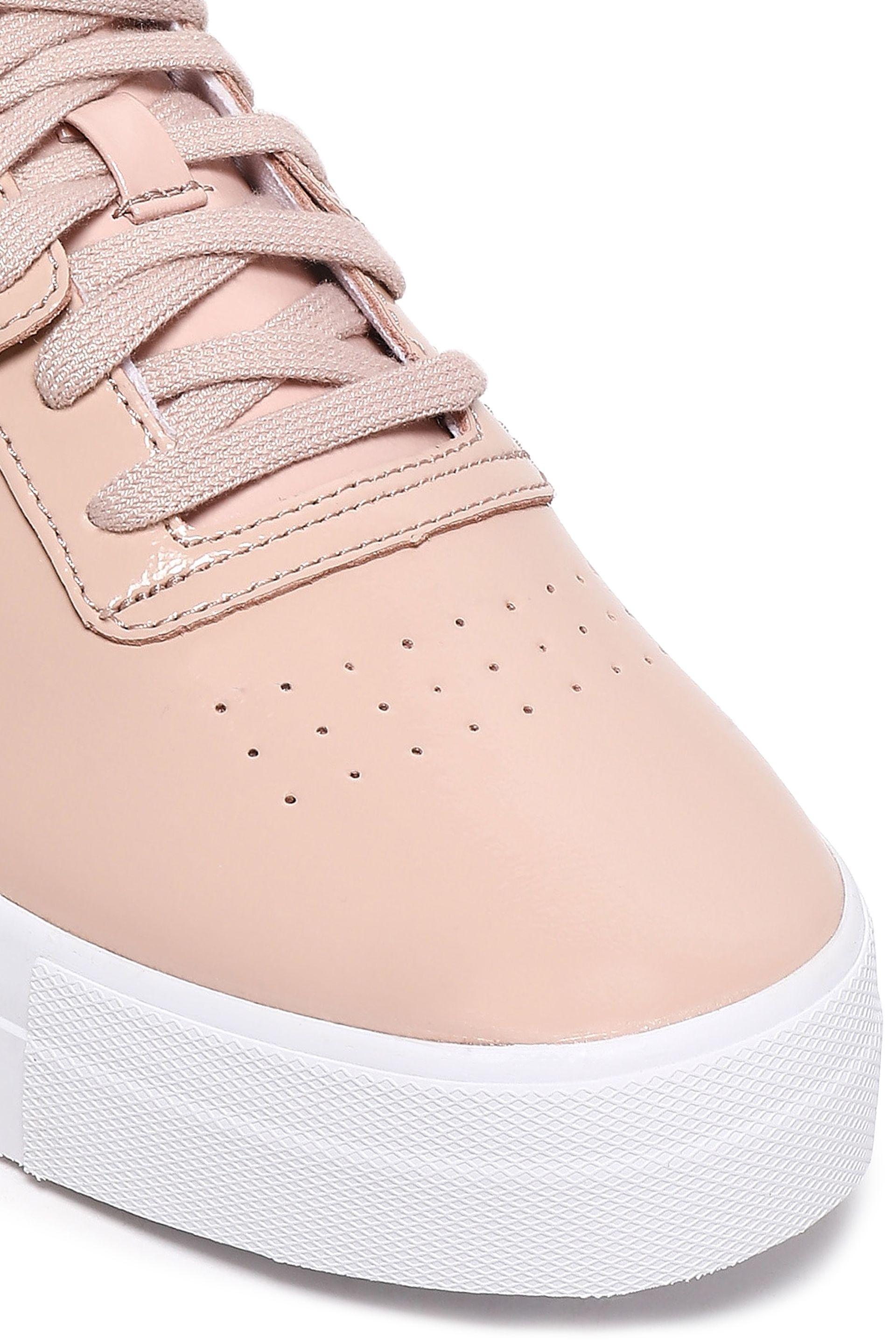 reebok pastel pink leather sneakers