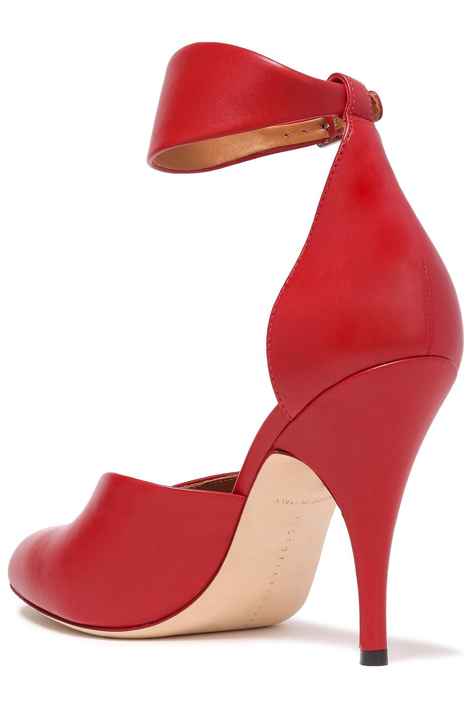red leather pumps with ankle strap