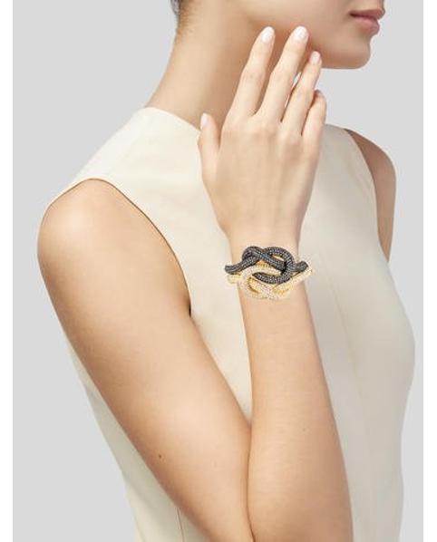 Lyst Rachel Zoe Crystal Love Knot Bracelet Gold In Metallic
