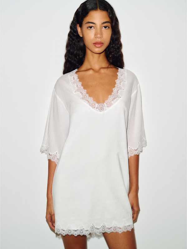 short white dress with long sleeves RHYTHM CHARLIZE LONG SLEEVE KNIT MINI DRESS