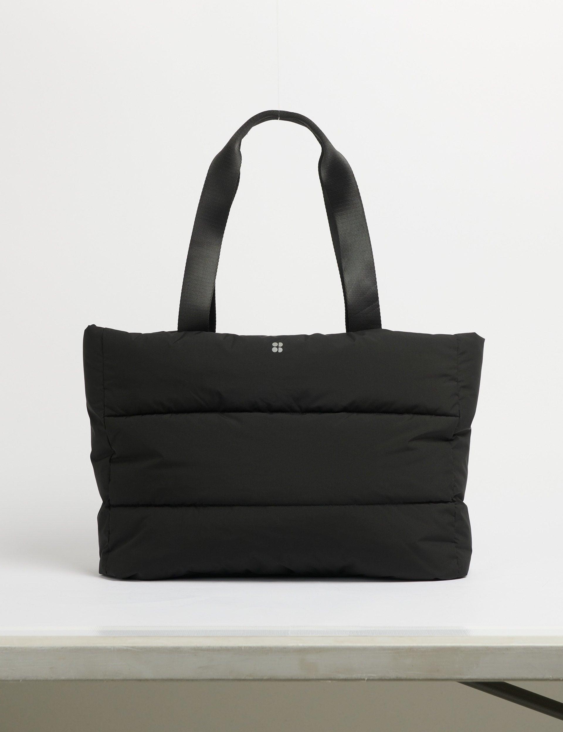 Black Nylon Sweaty Betty Pannier bag. New Sweaty Betty | The Nimbus Roam Weekender - Black | The  main image 3