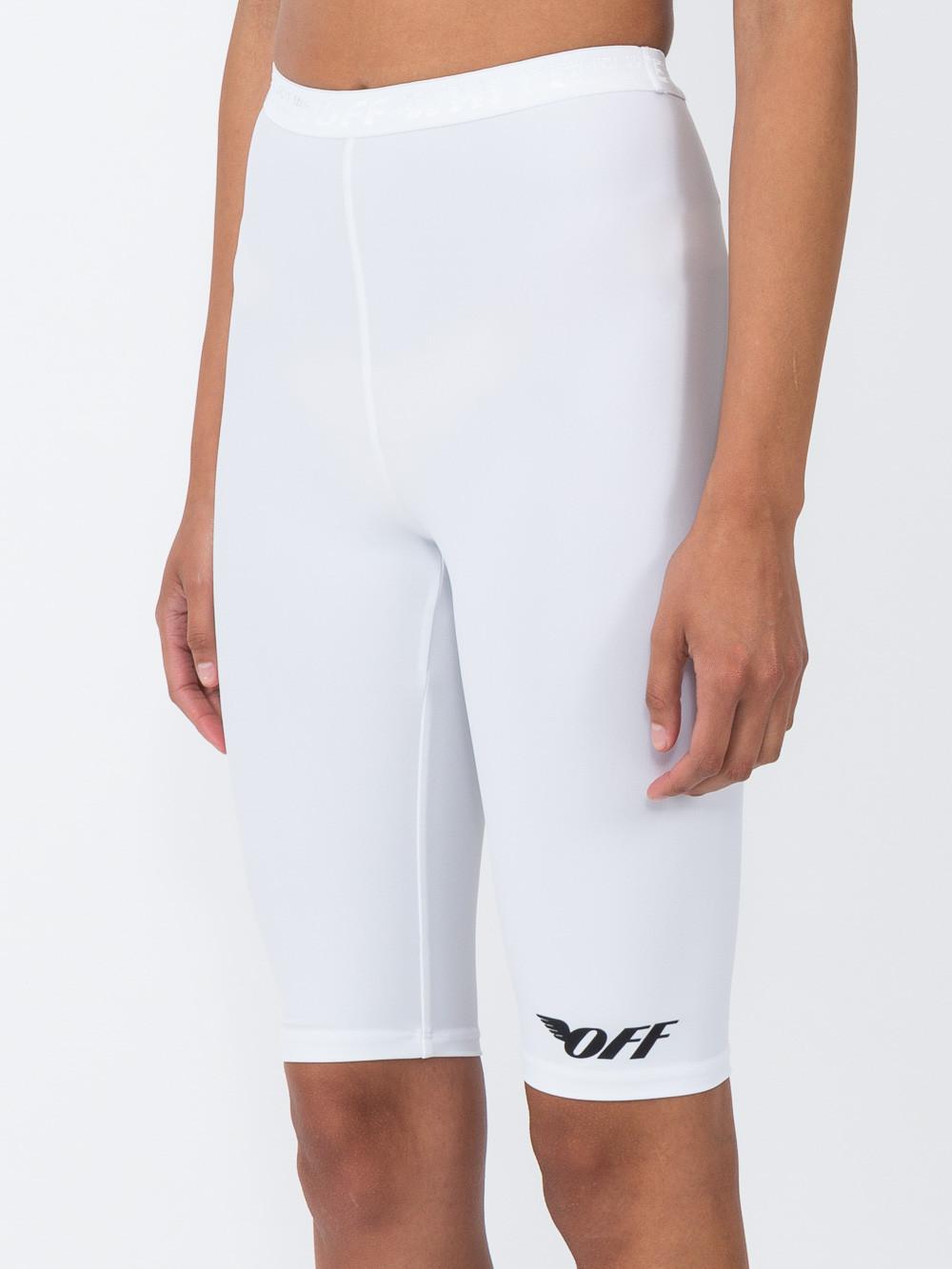white cycling pants