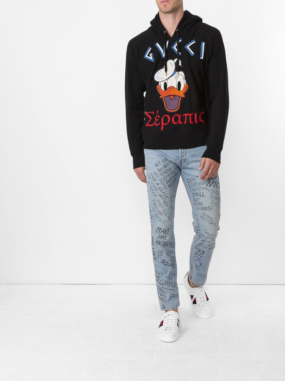 gucci jeans with writing