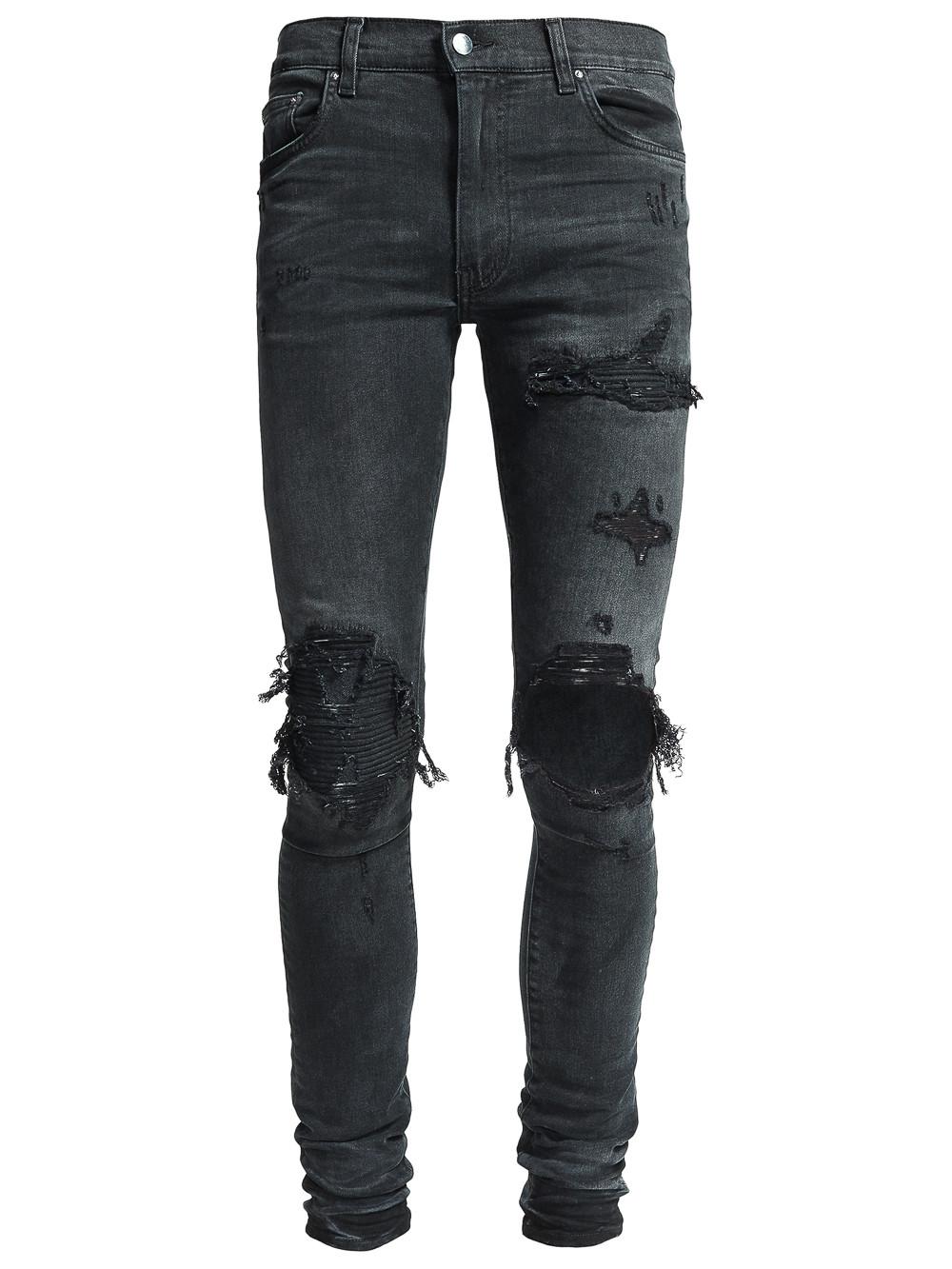 black amiri jeans with patches