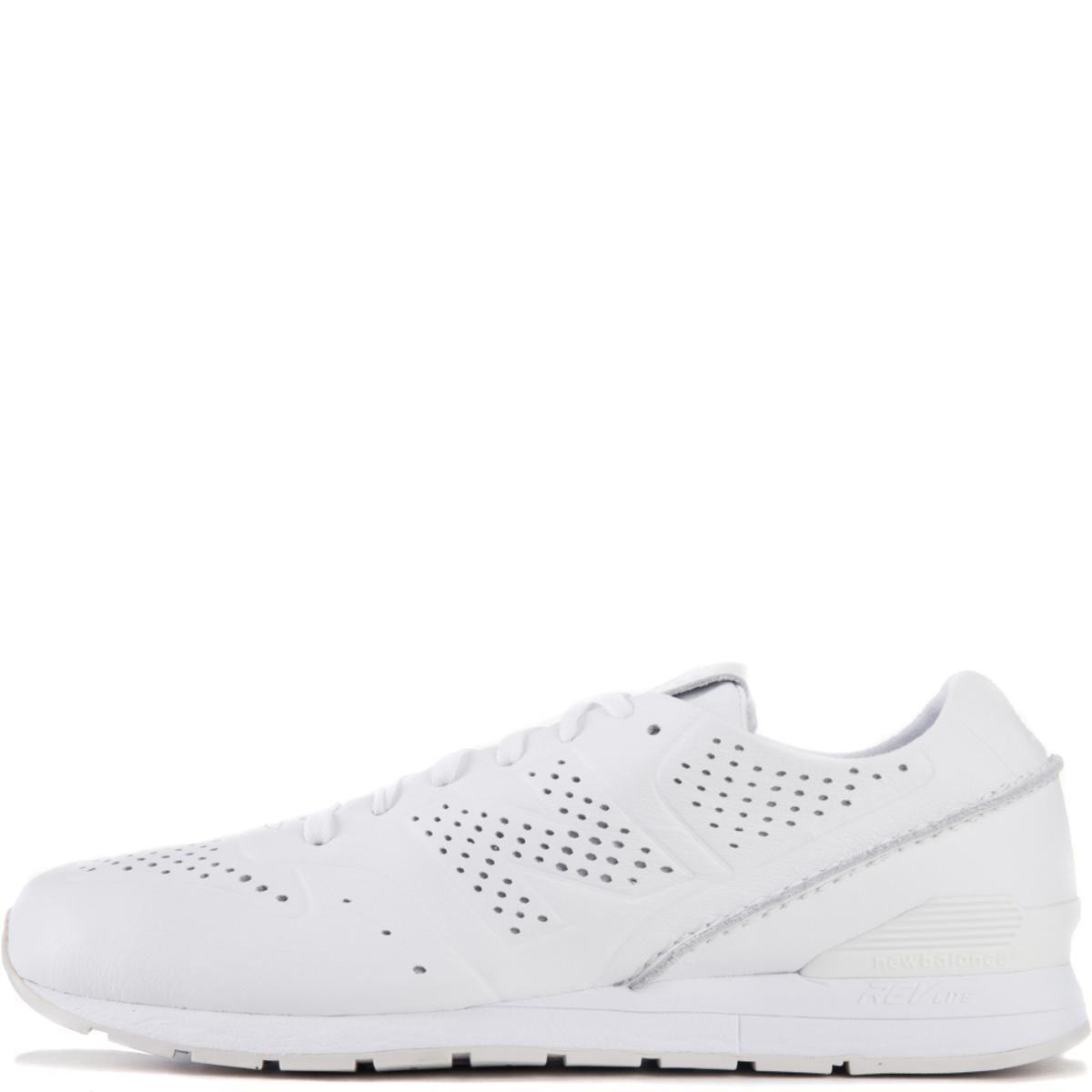 white leather running shoes