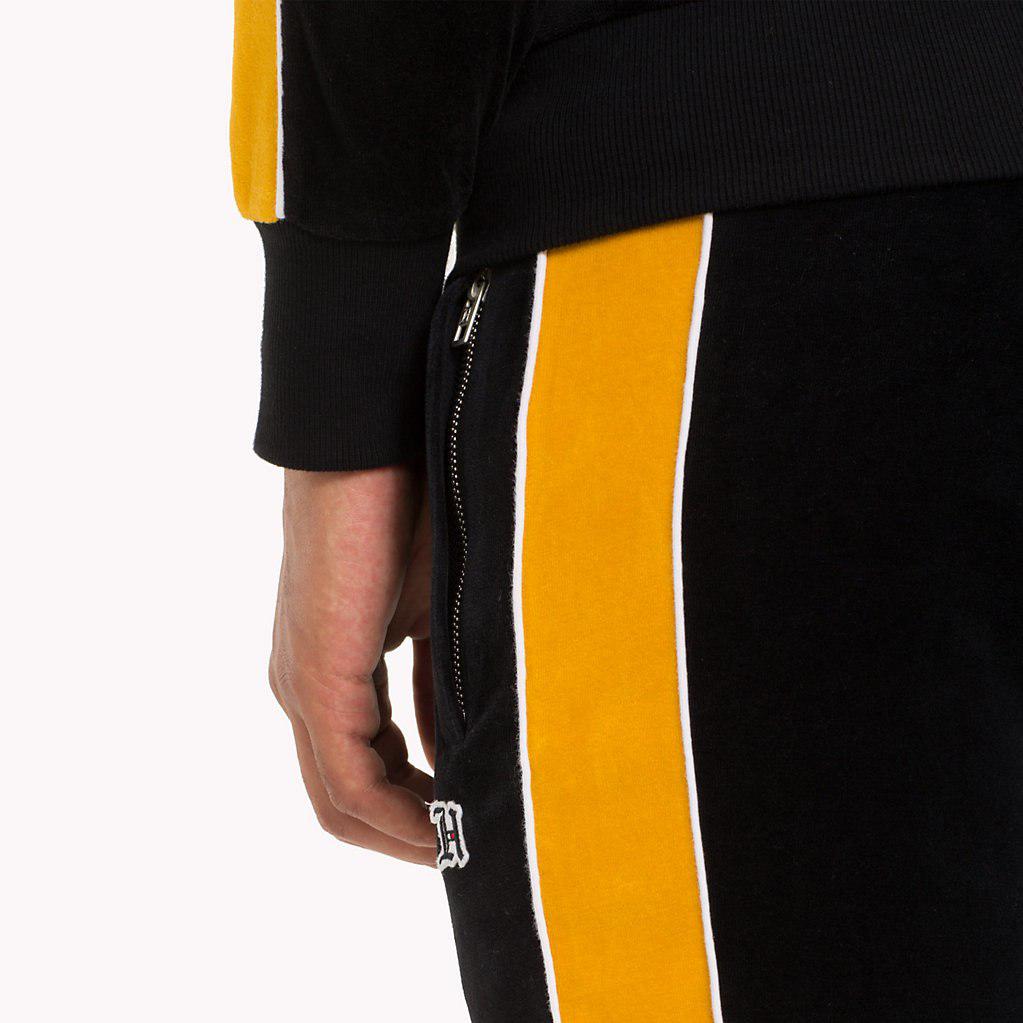 black tracksuit yellow stripe
