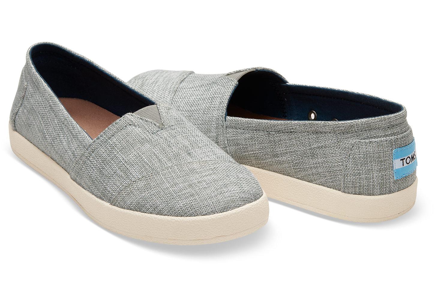 black and grey slip ons