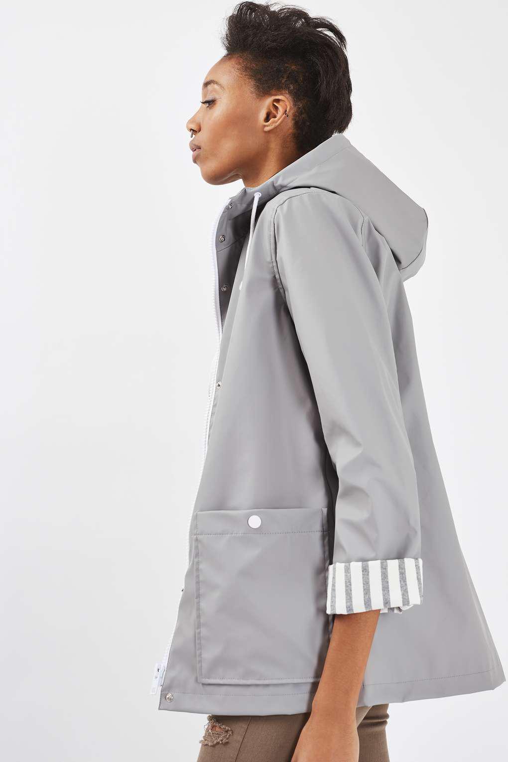grey hooded rain mac