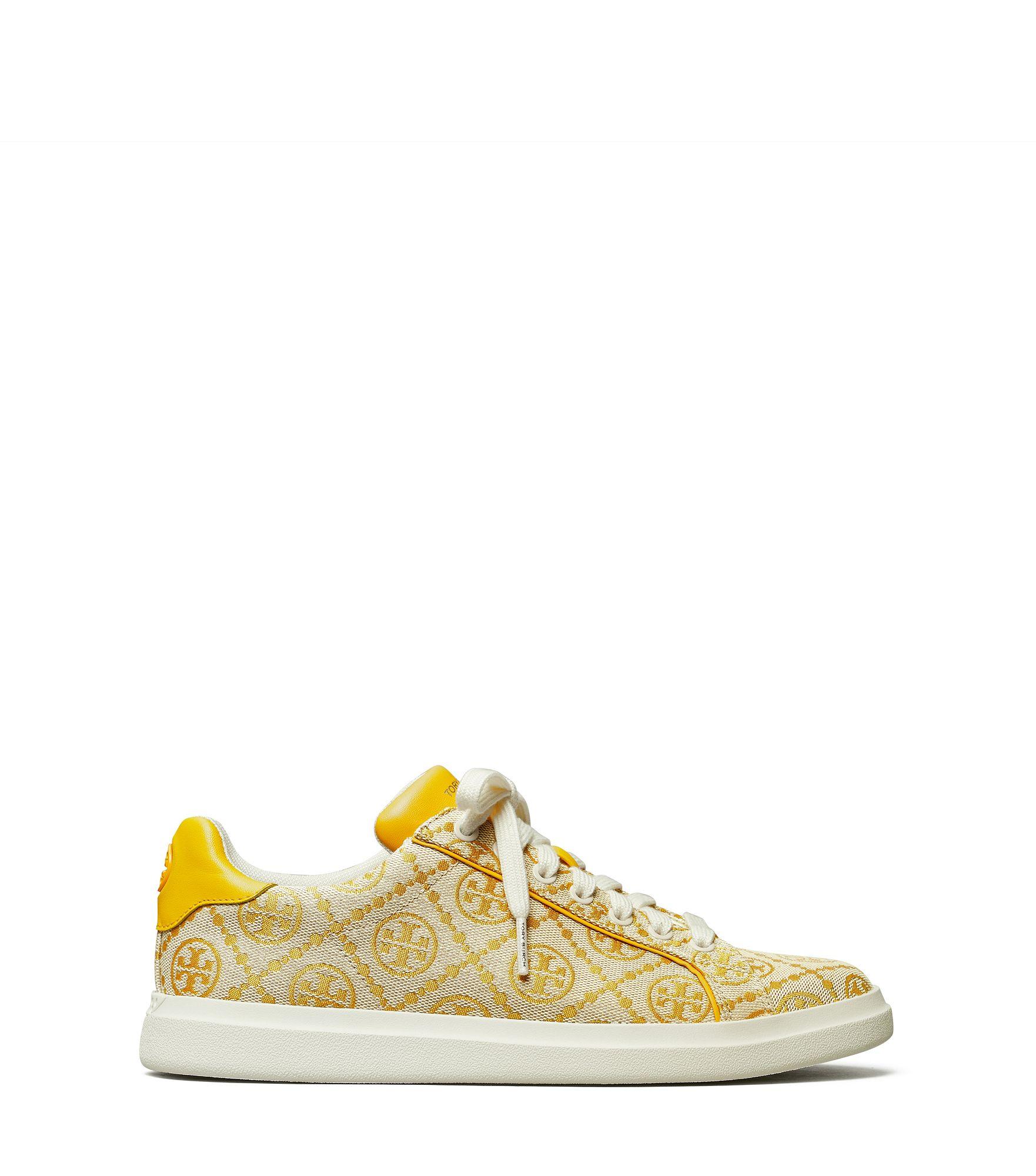 Tory Burch Leather Howell T Monogram Court Sneaker in Yellow - Lyst