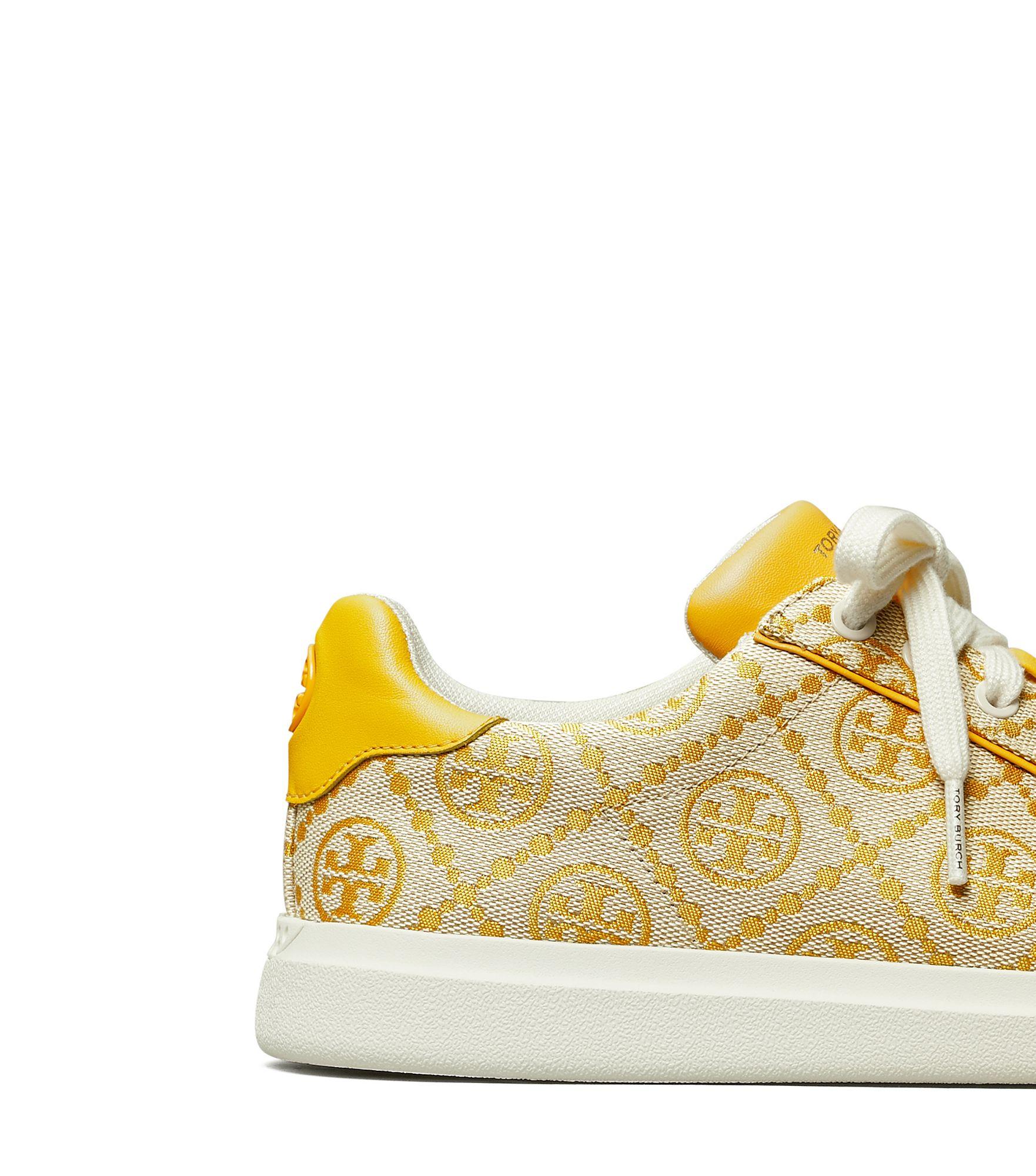 Tory Burch Leather Howell T Monogram Court Sneaker in Yellow - Lyst