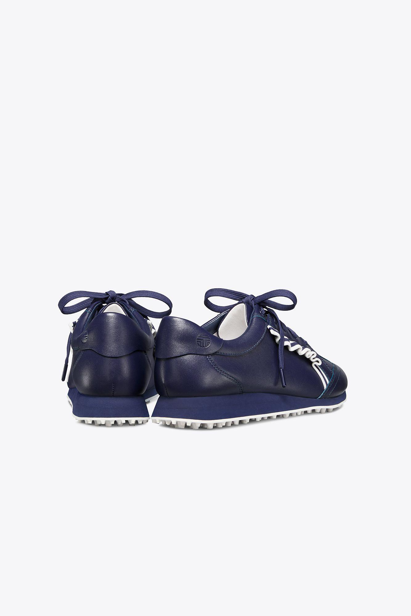 tory burch golf ruffle trainers